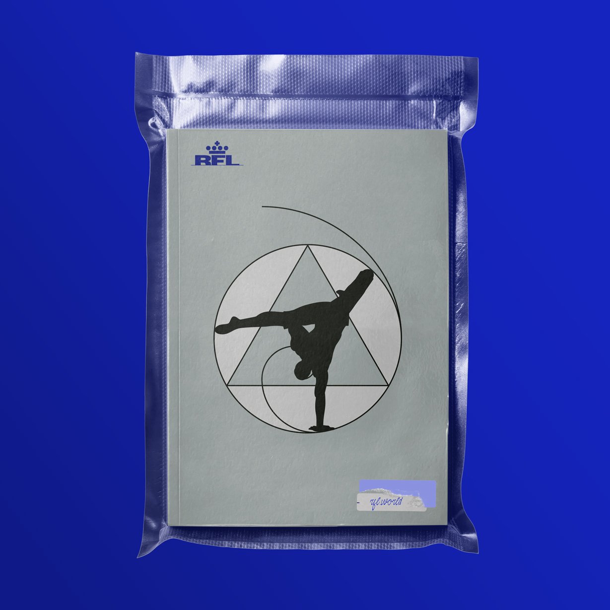 Plastic-wrapped notebook with geometric design and silhouette of dancer
