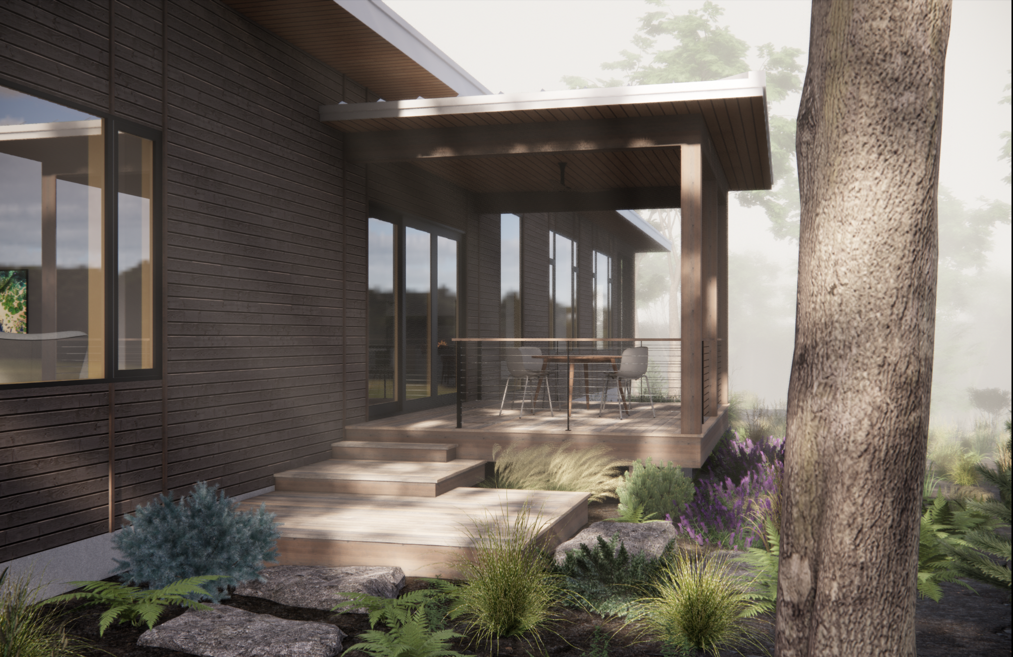 A modern wooden house porch with steps, overlooking landscaped garden with rocks, bushes, and purple flowers, and surrounded by trees.