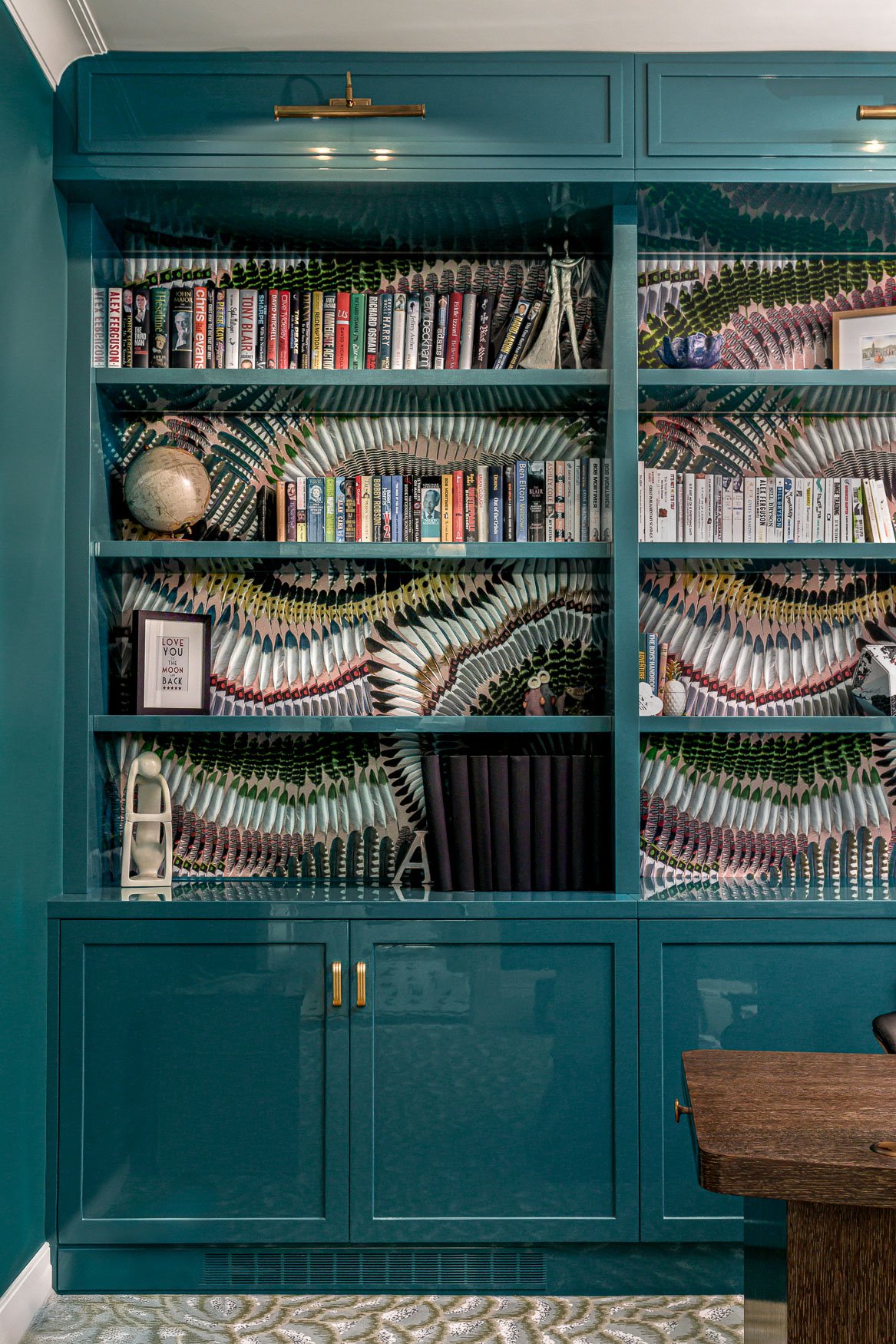 Colourful bespoke joinery in the family office room