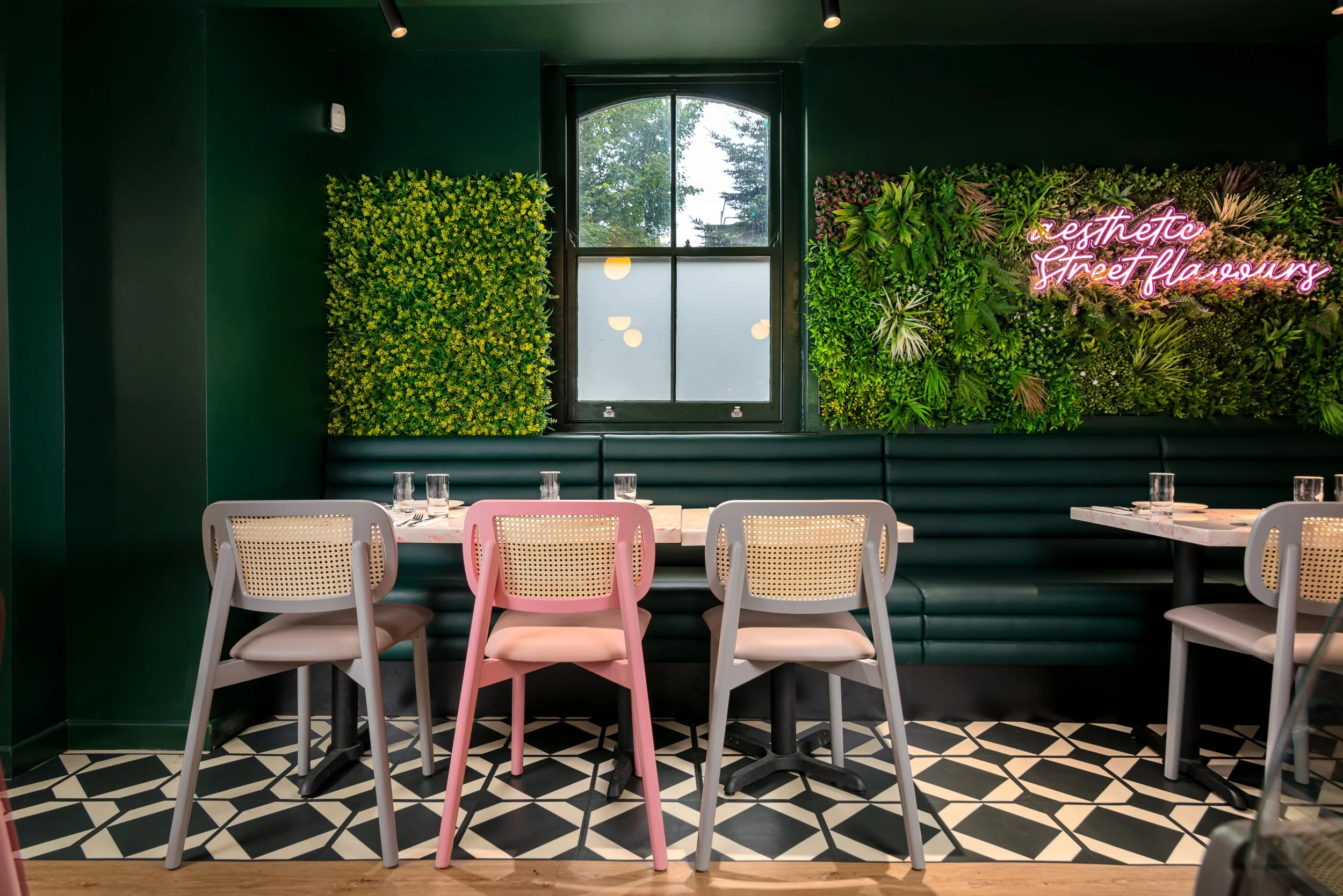 Hospitality interior with seating, lighting and wall details for local business photography Hackney, London.