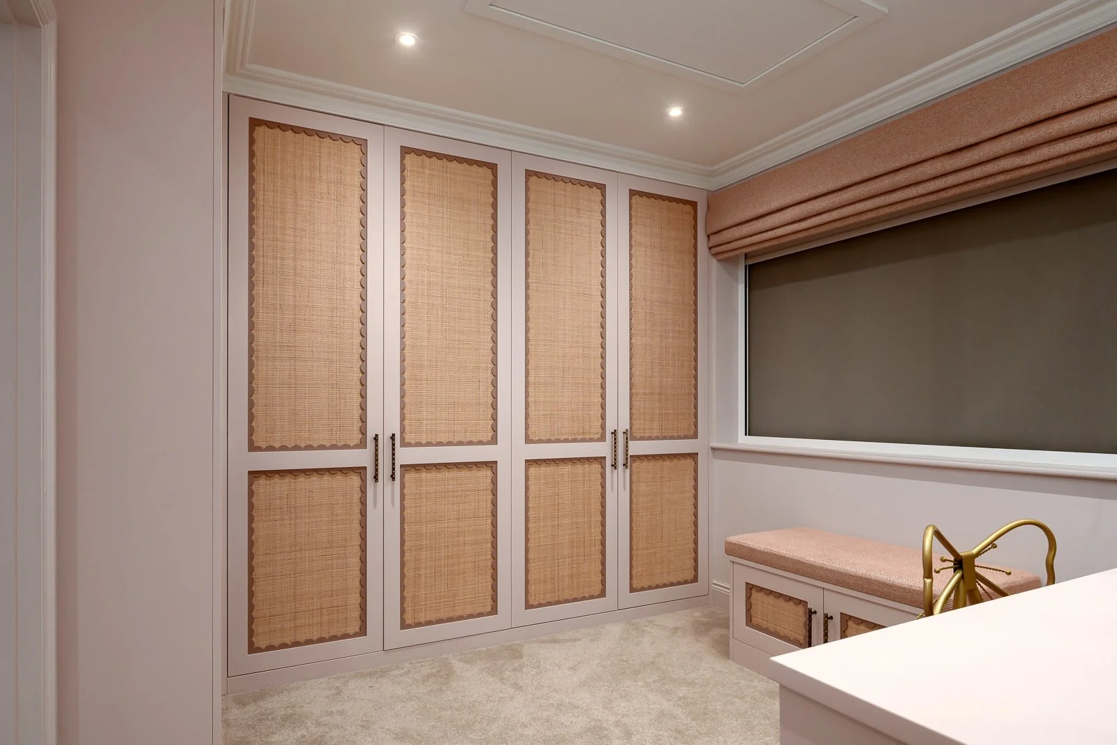 Bedroom detail at Newlands by Rebecca Sudic Interiors, showing soft colour, styling and fitted furniture within the completed family home.