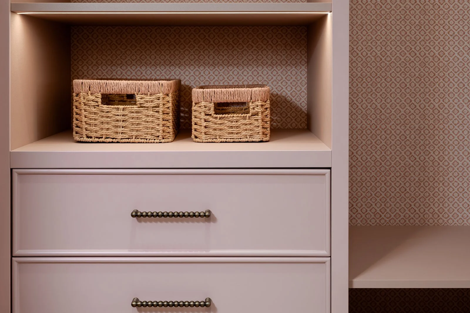 Bespoke fitted joinery at Newlands by Rebecca Sudic Interiors, photographed to show craftsmanship, storage and material detail.