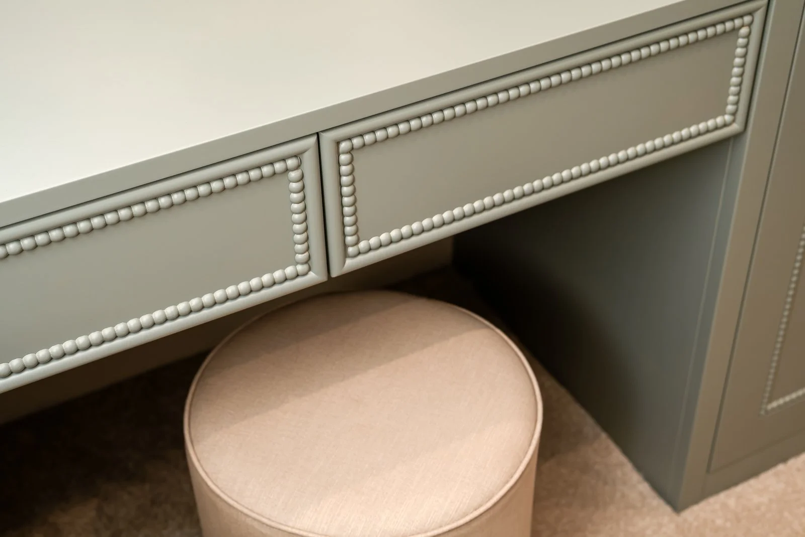 Bespoke fitted joinery at Newlands by Rebecca Sudic Interiors, photographed to show craftsmanship, storage and material detail.