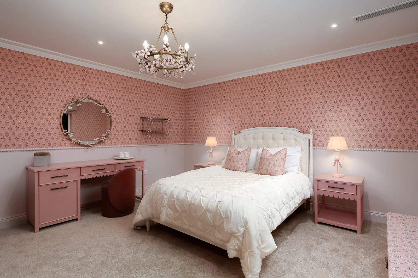 Bedroom detail at Newlands by Rebecca Sudic Interiors, showing soft colour, styling and fitted furniture within the completed family home.