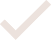 A white checkmark on a transparent background.