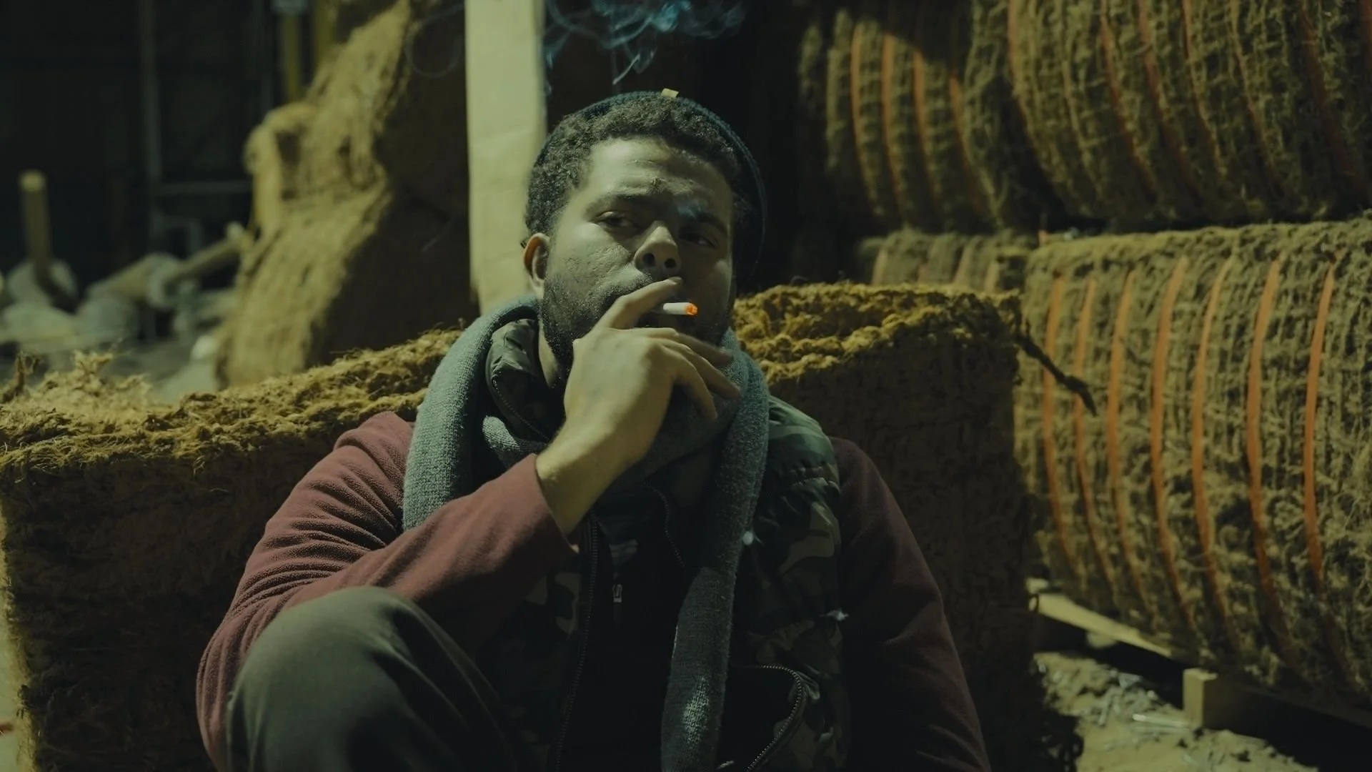 Screenshot from a demo reel of male actor smoking