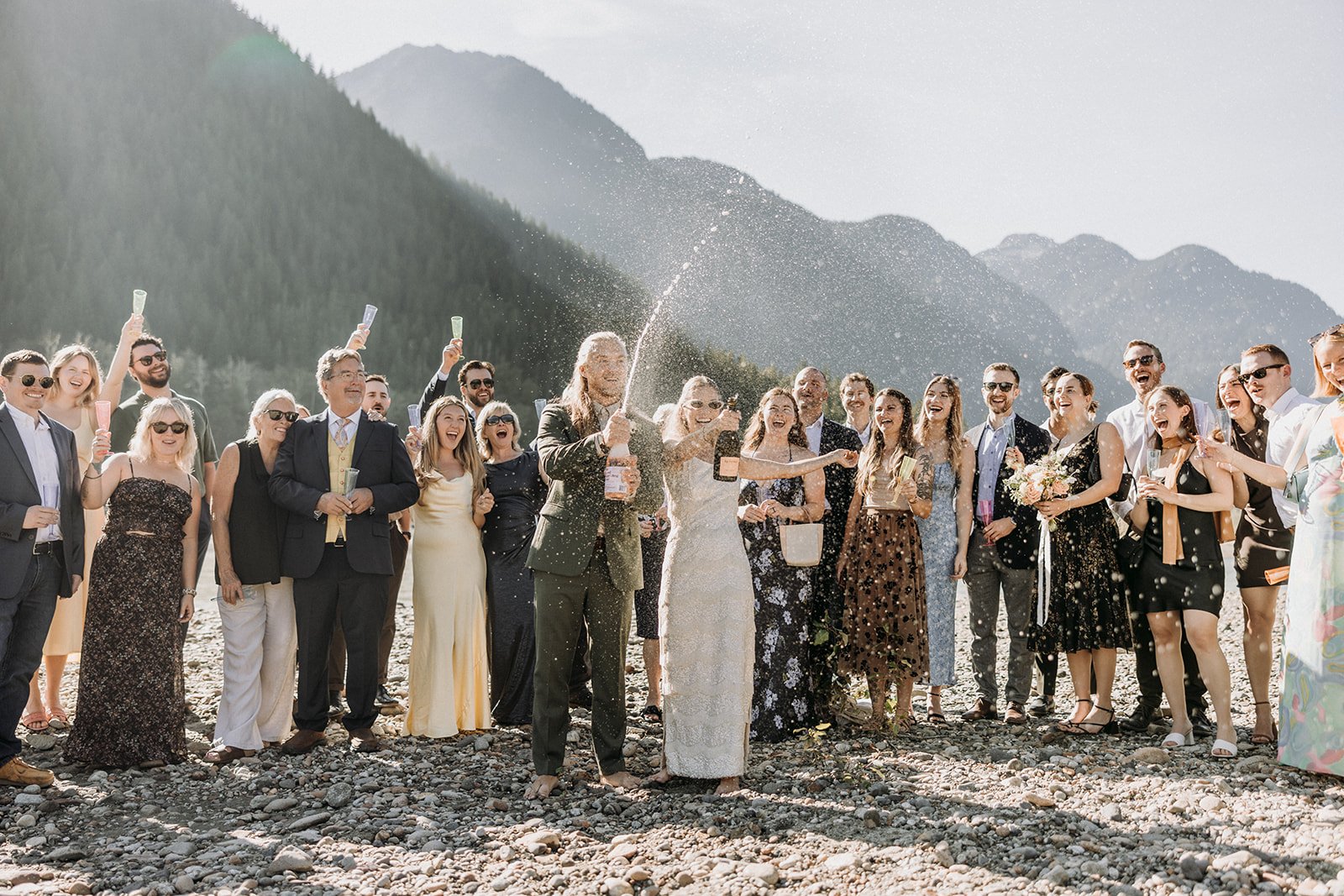 💛 E + R gathered a small crew of their favorite people by the river, kicked off their shoes for a barefoot ceremony, tied the knot... Then celebrated with bubbles🍾 before @theshredshuttle took everyone to @sunwolfbc for a @fergiescafesquamish dinne