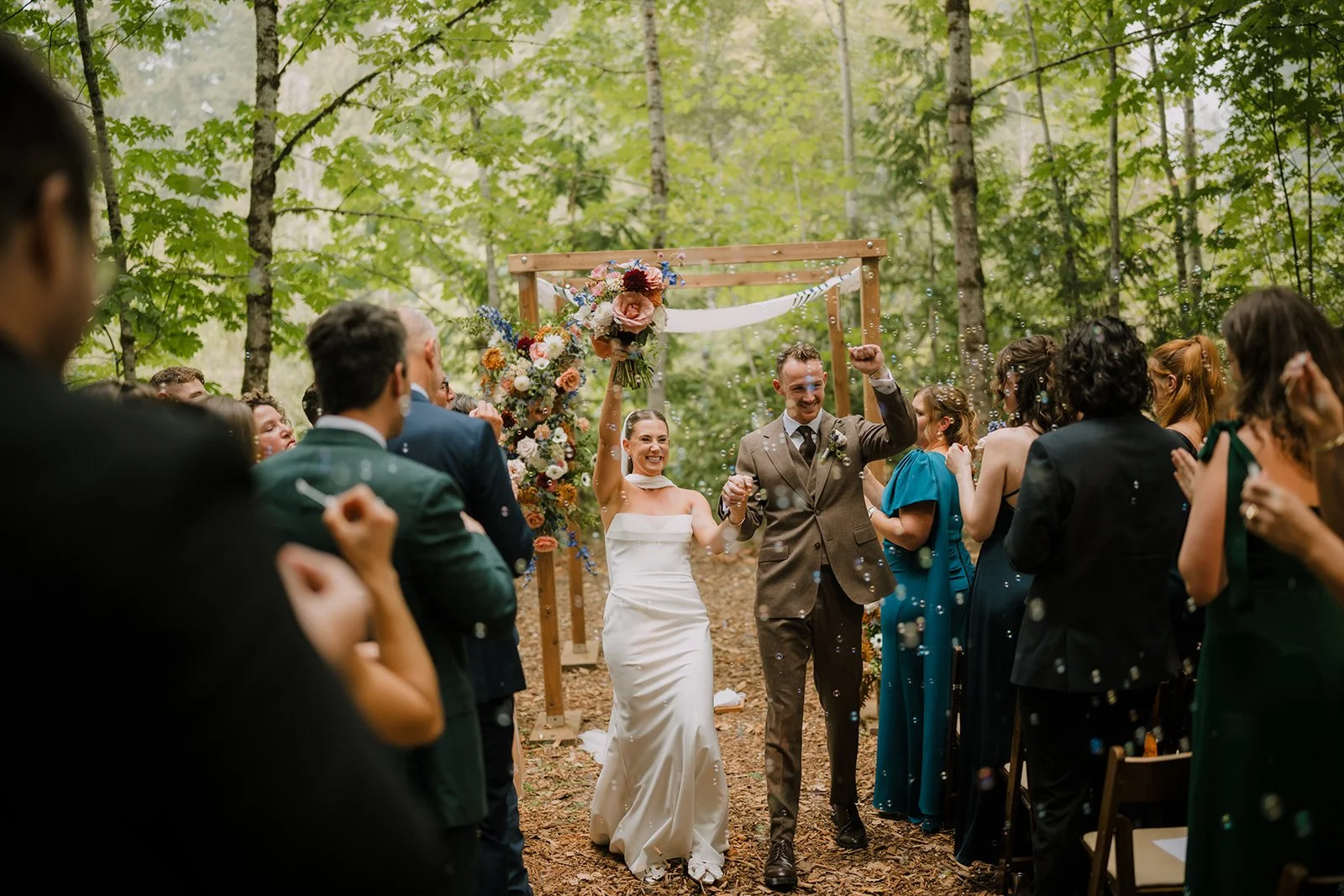 A beautiful celebration at @sunwolfbc, captured by @loganswayzephoto for this absolutely gorgeous couple. The bubble recessional was perfection. 🫧
G + J - I miss you already. Please consider getting married to each other again, haha. 

Florals by @d