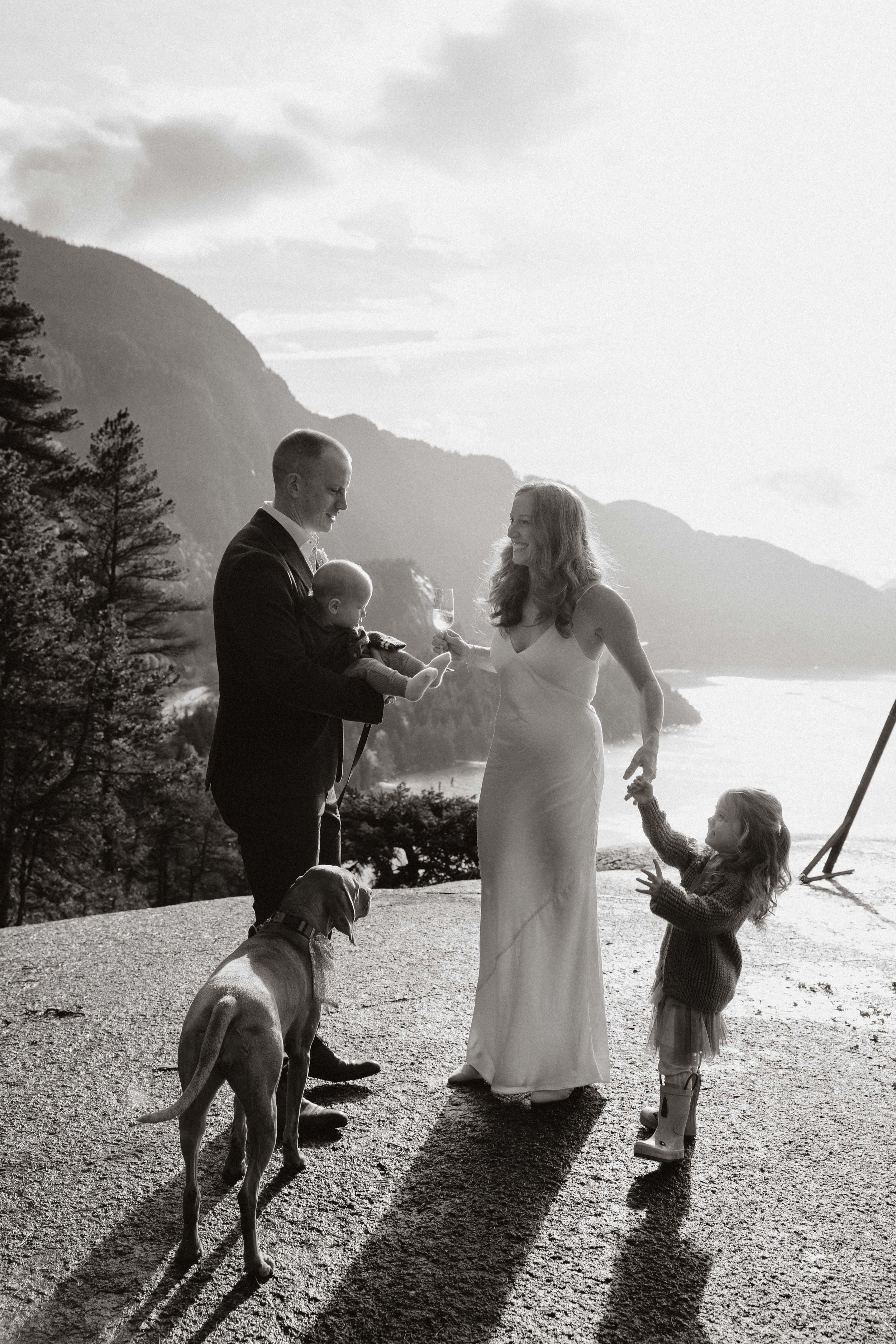 A bride and groom eloping in Squamish, with their children and dog