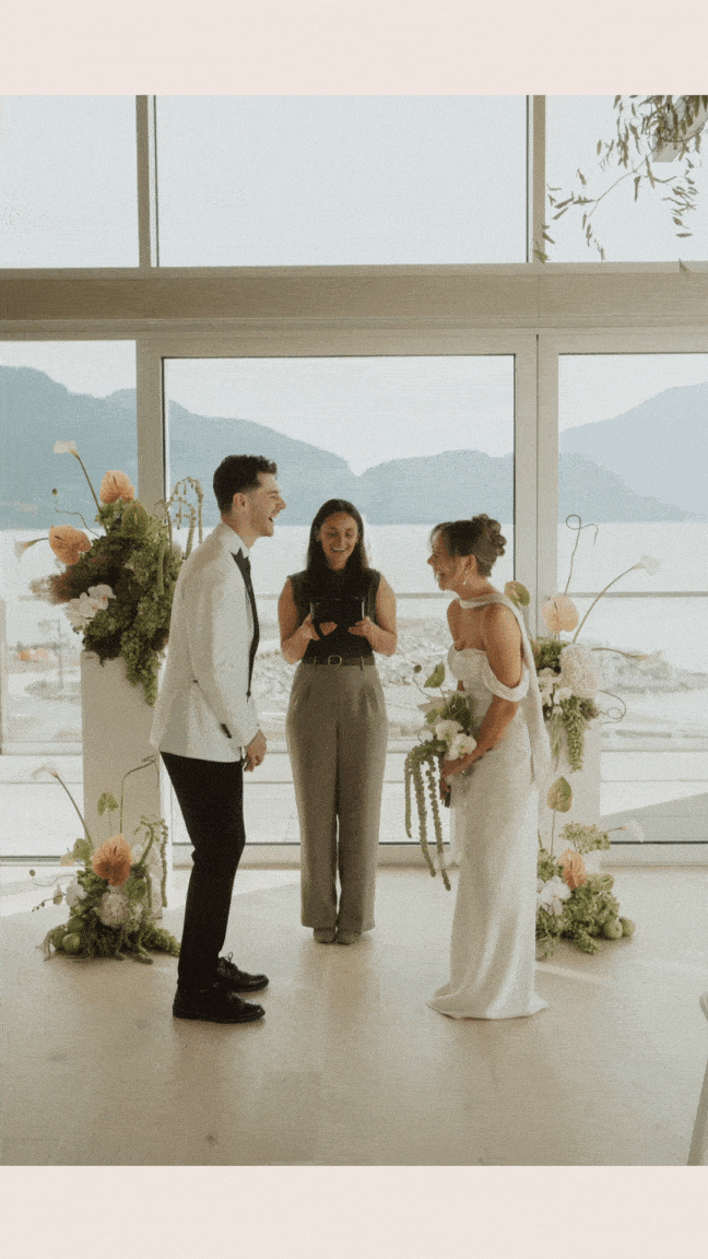 Jude Douglass laughs with a couple at their wedding ceremony