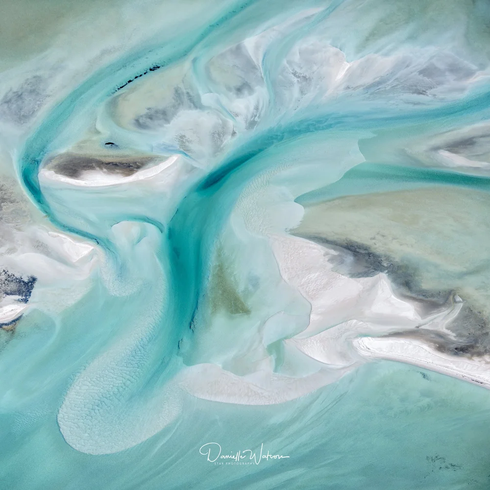Aerial abstract of turquoise water and sand banks in Shark Bay