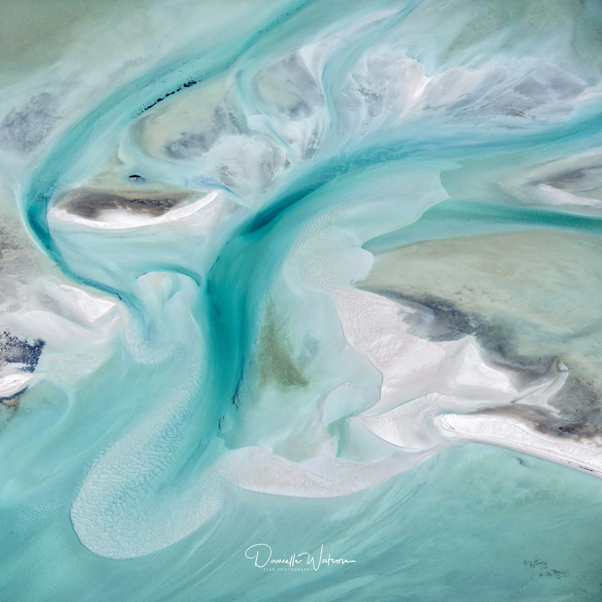 Aerial abstract of turquoise water and sand banks in Shark Bay