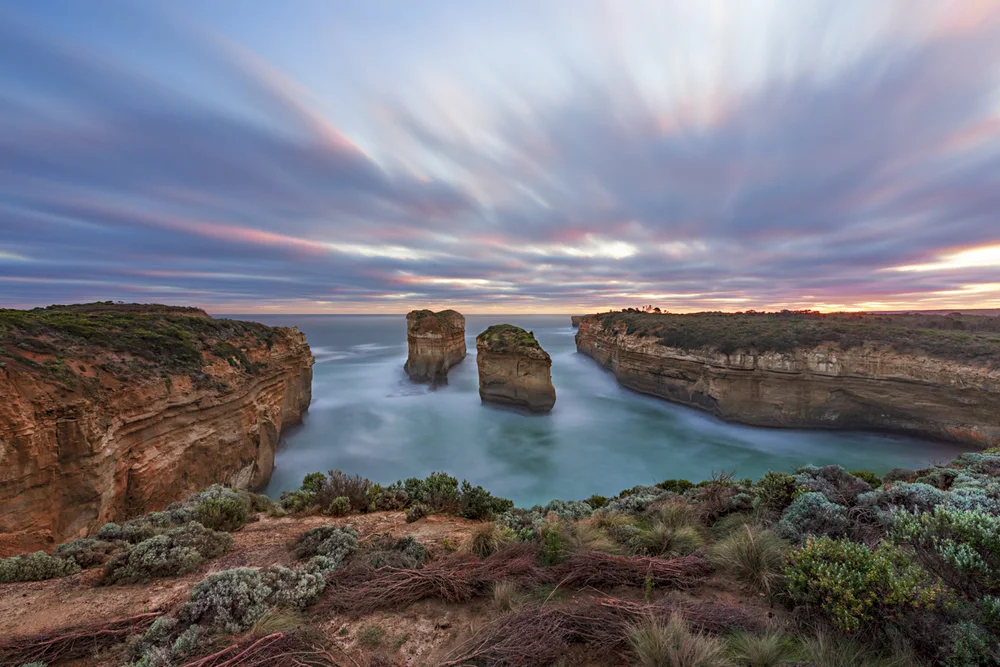 Rock stacks along the Great Ocean Road coastline at sunset