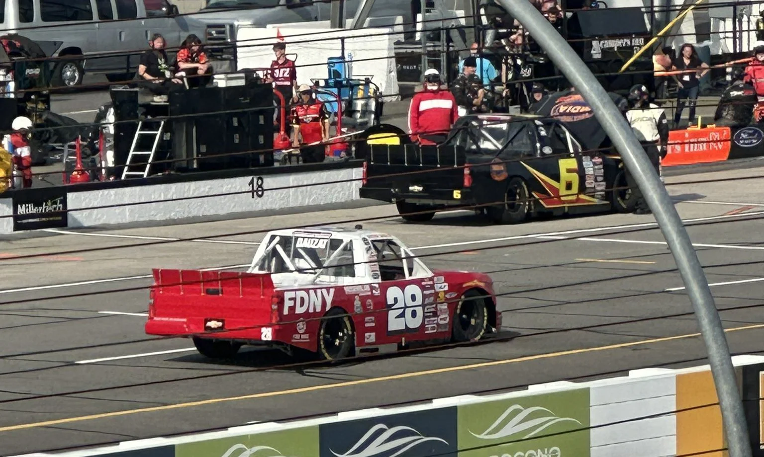 TRUCKS: NASCAR’s strict enforcement of minimum speed at Pocono leads to last-place battle between Bryan Dauzat and Norm Benning