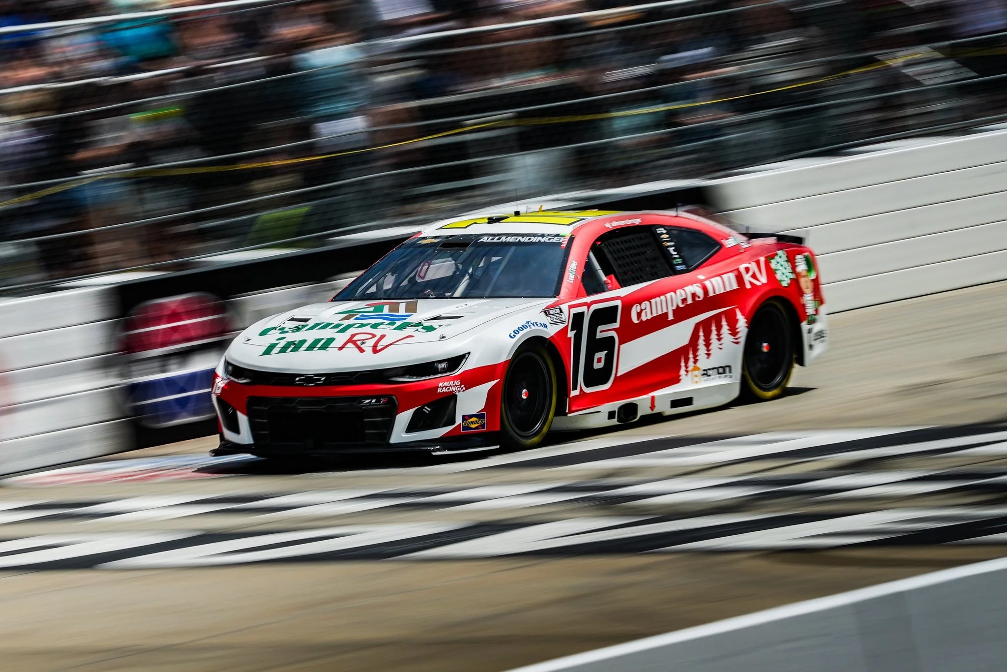 CUP: A.J. Allmendinger unable to follow two others out of the garage and back onto Dover track