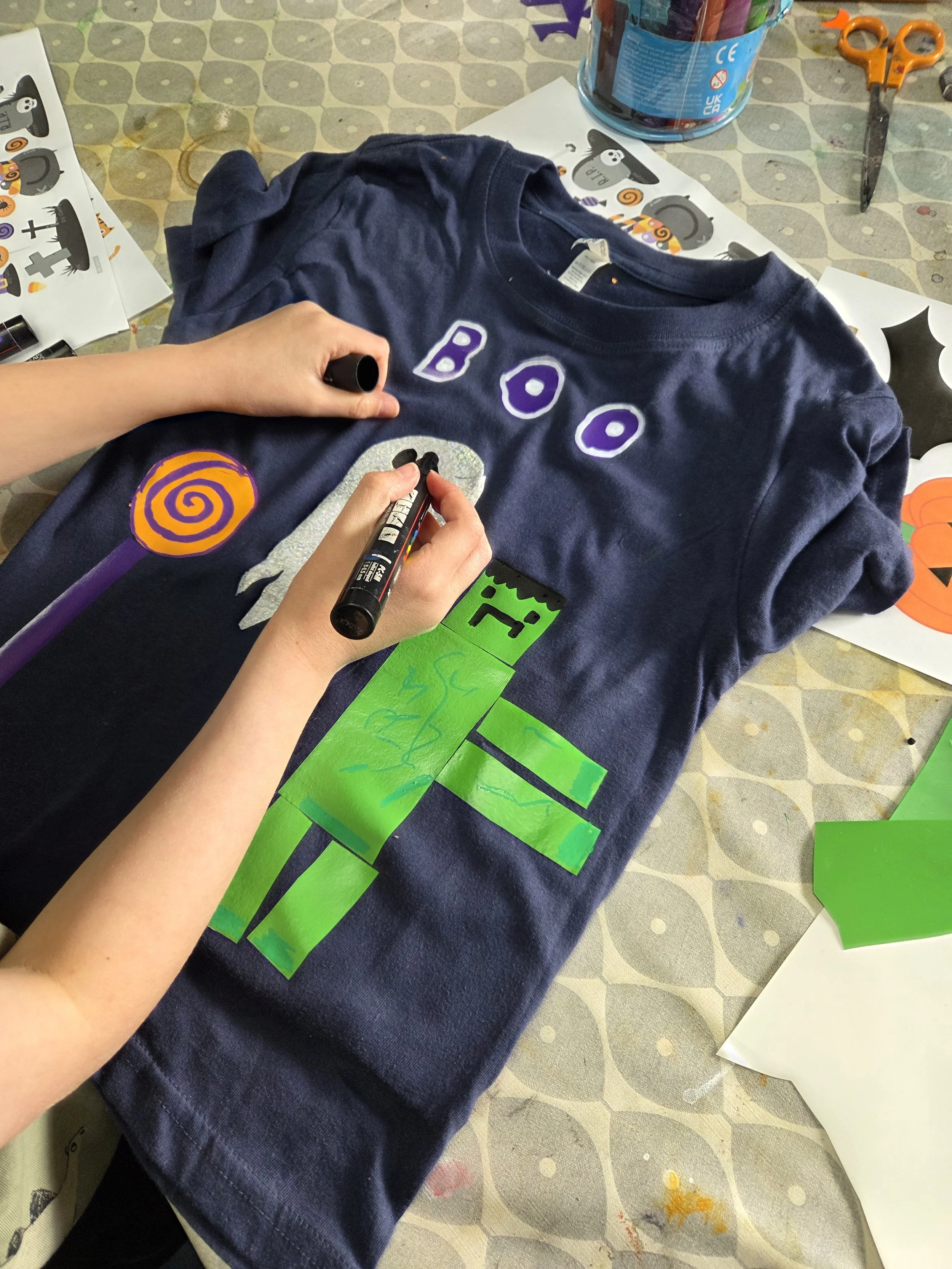 t shirt with green zombie figure