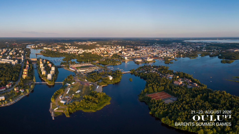 Aerial view of Oulu on a sunny day, showing waterways, islands, residential areas, and the city center in the distance. Text on the image reads: ‘21–23 August 2026 Oulu FI Barents Summer Games.