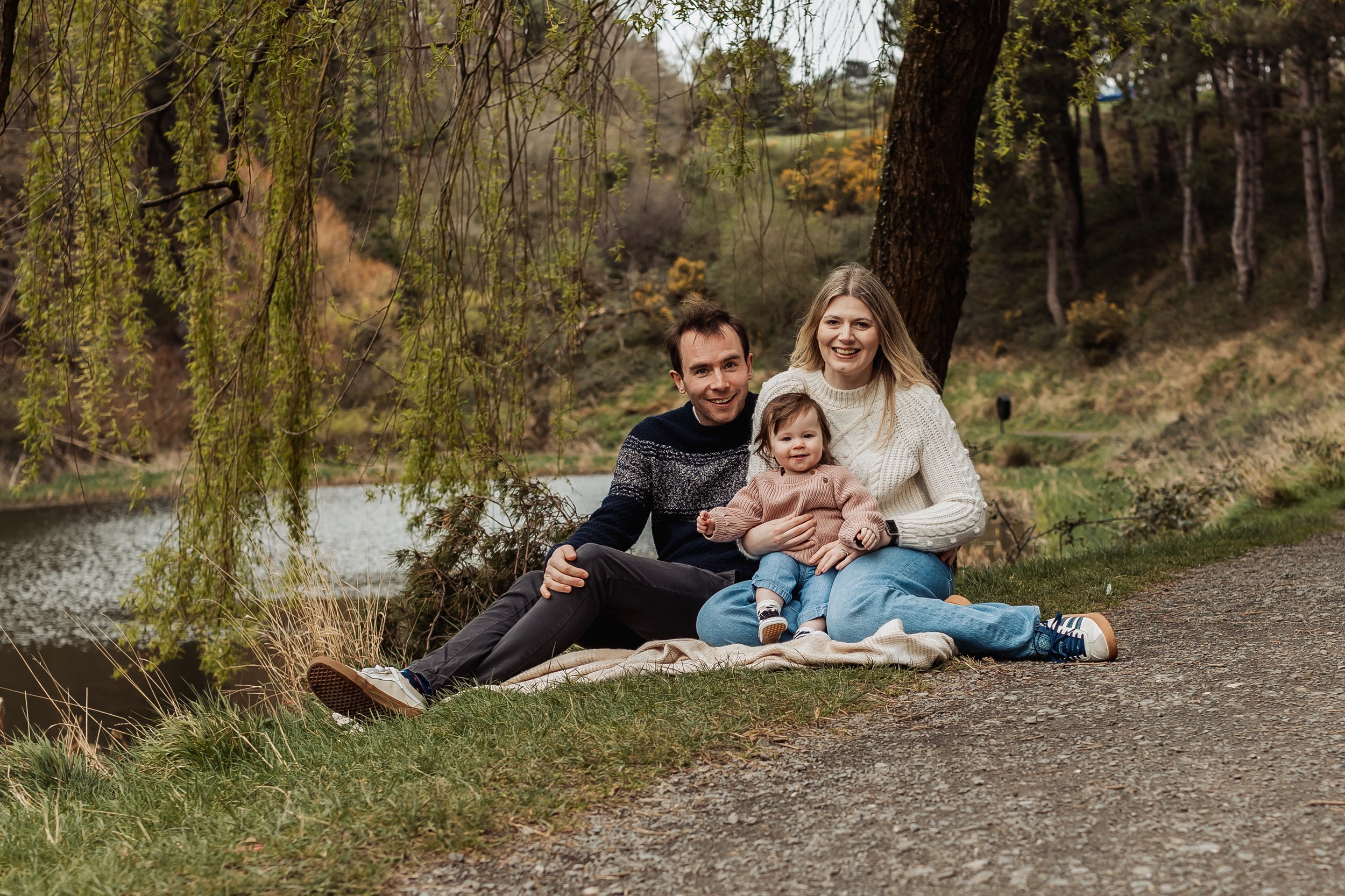 Family of 3 in the Phoenix park during mini family photoshoot