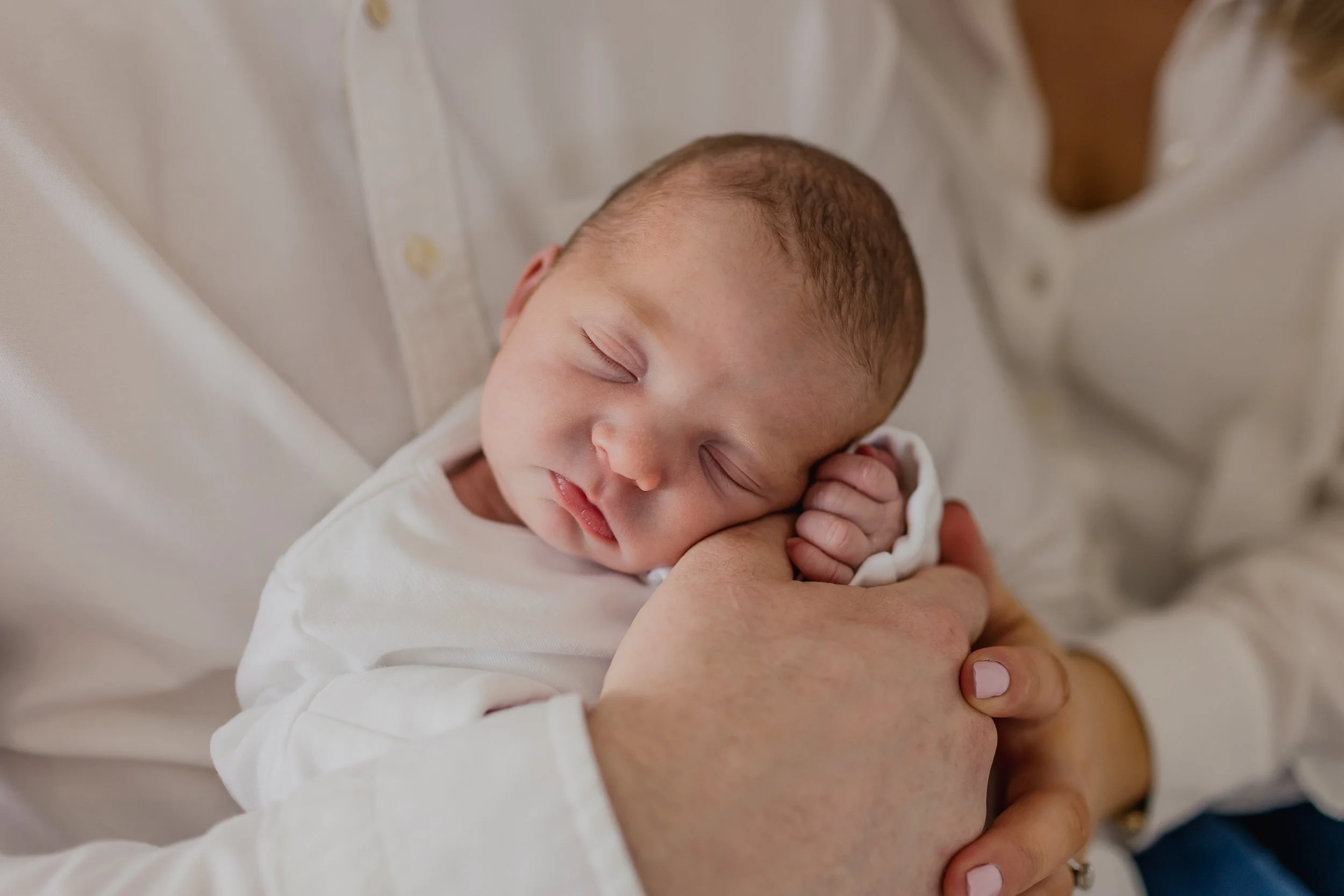 Newborn baby photographed at home during photoshoot Dublin