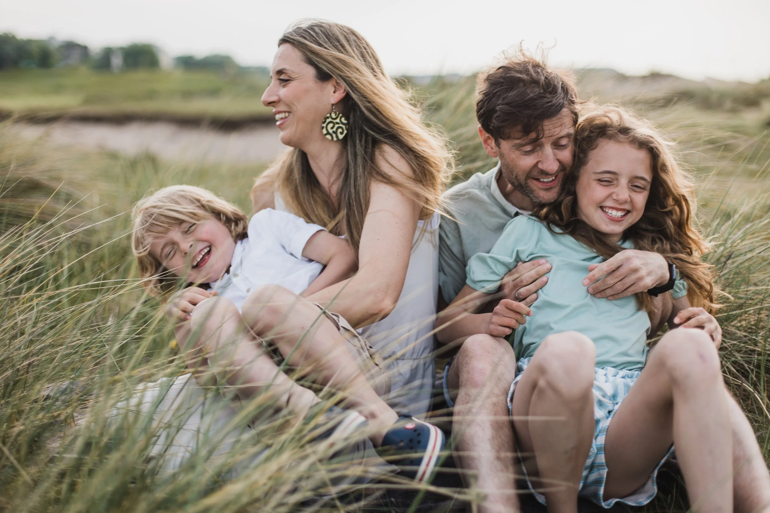 Family of 4 having fun during Family photoshoot Dollymount