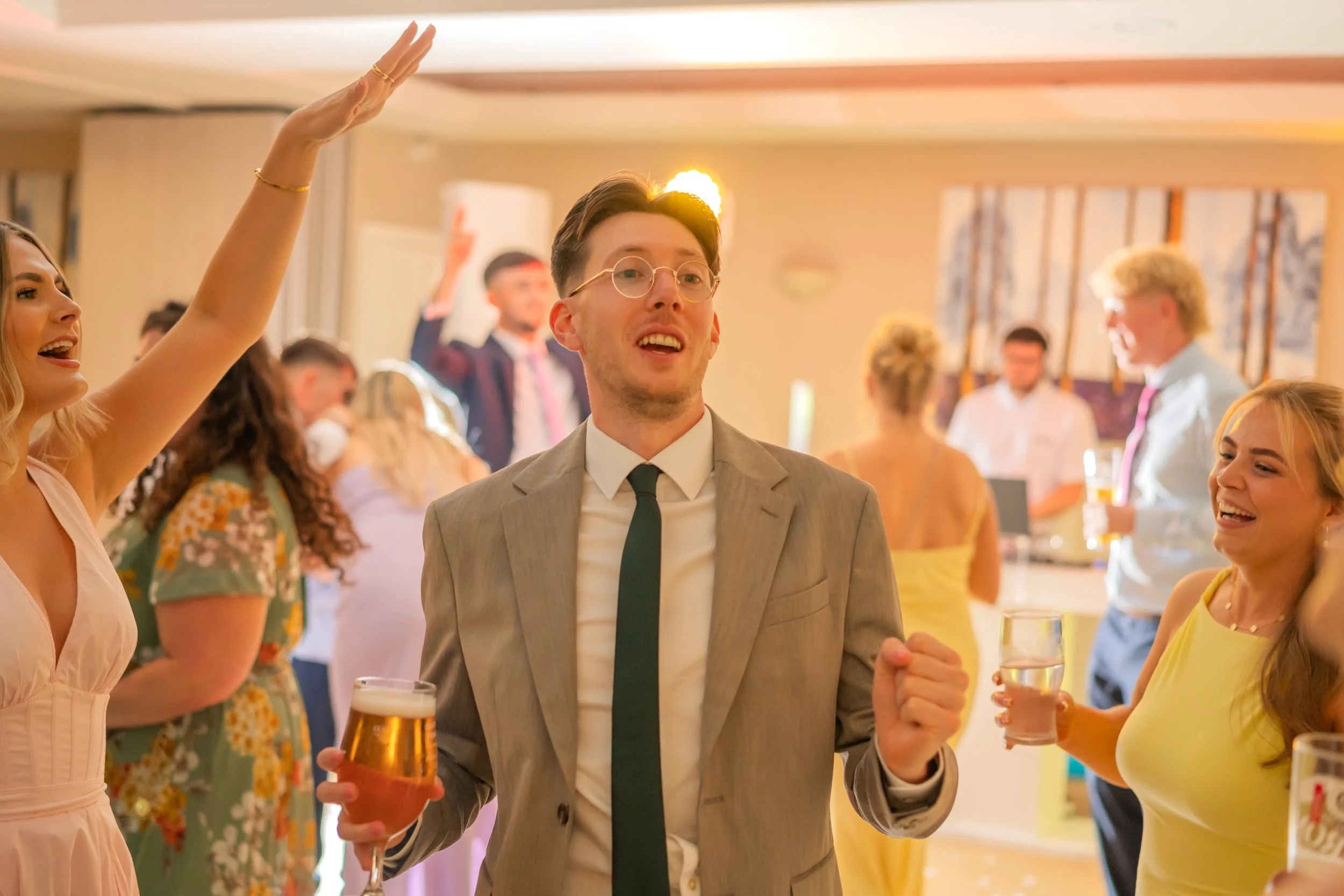 Wedding guests celebrating at Sudbury House.jpg