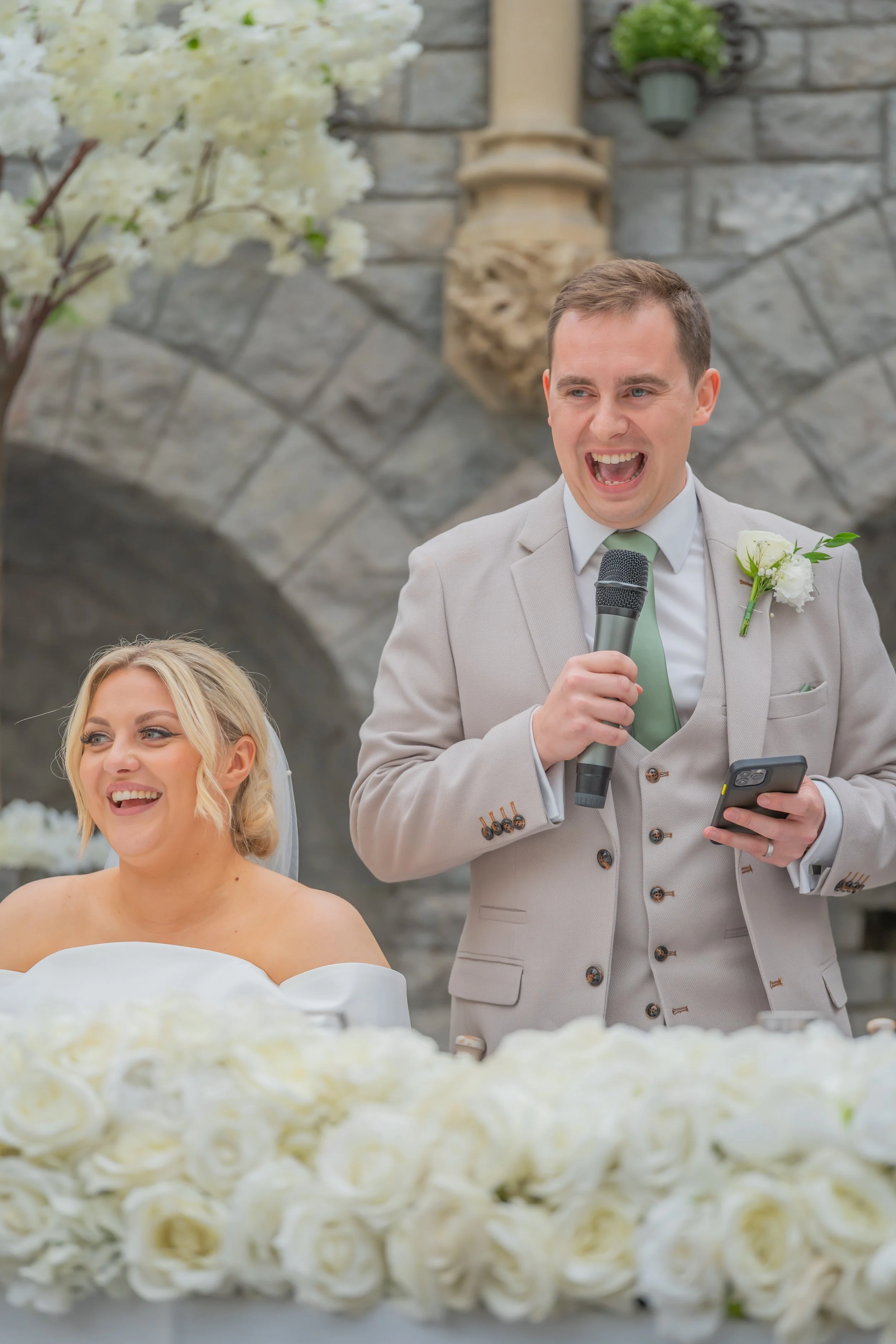 The groom making everyone laugh during the wedding speeches at Tortworth Court.jpg