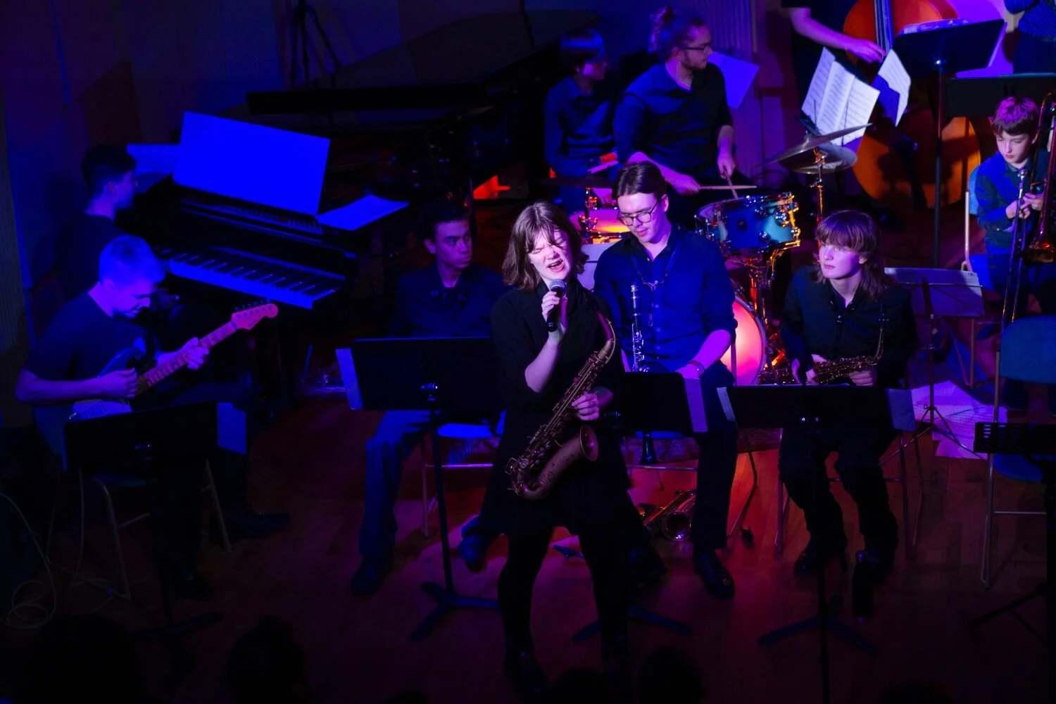 Ensemble with singer-saxophonist; guitar, drums and piano accompany.