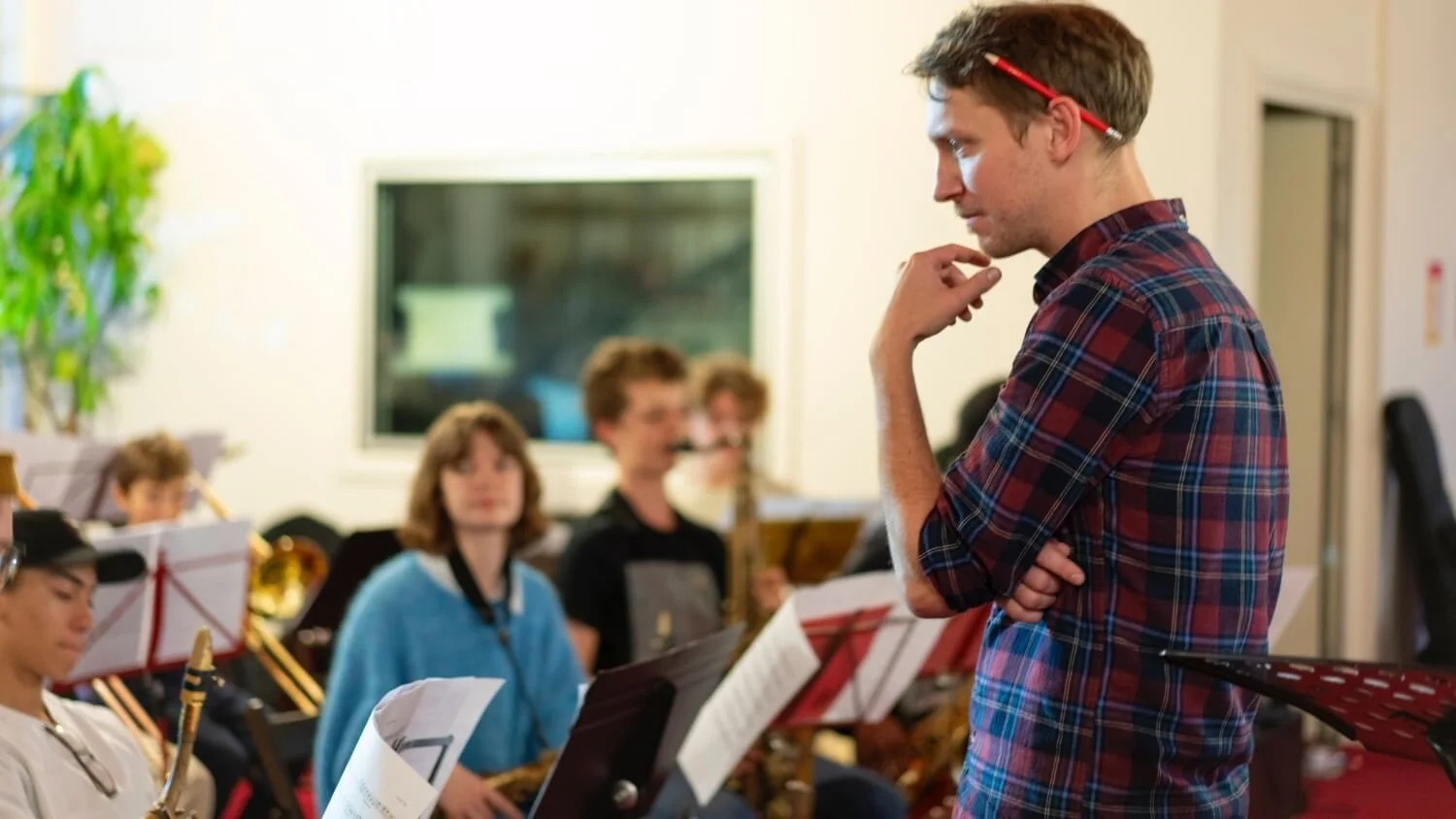 Alex Thomas-French teaching big band students.