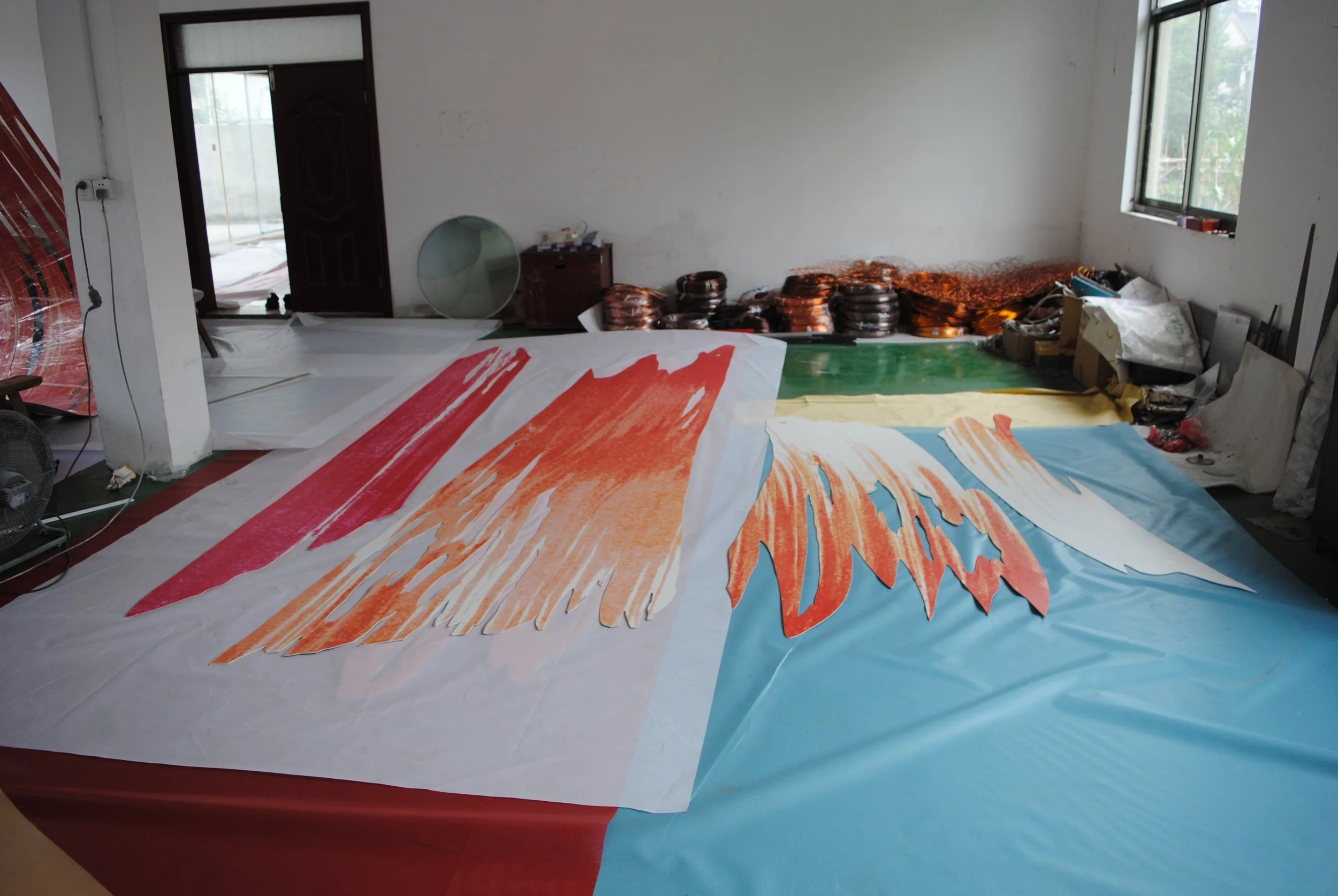 Meanwhile in Shanghai, UAP was laser cutting the aluminum components for each part and printing them with an exact, high resolution scan of my original ink brushstroke.