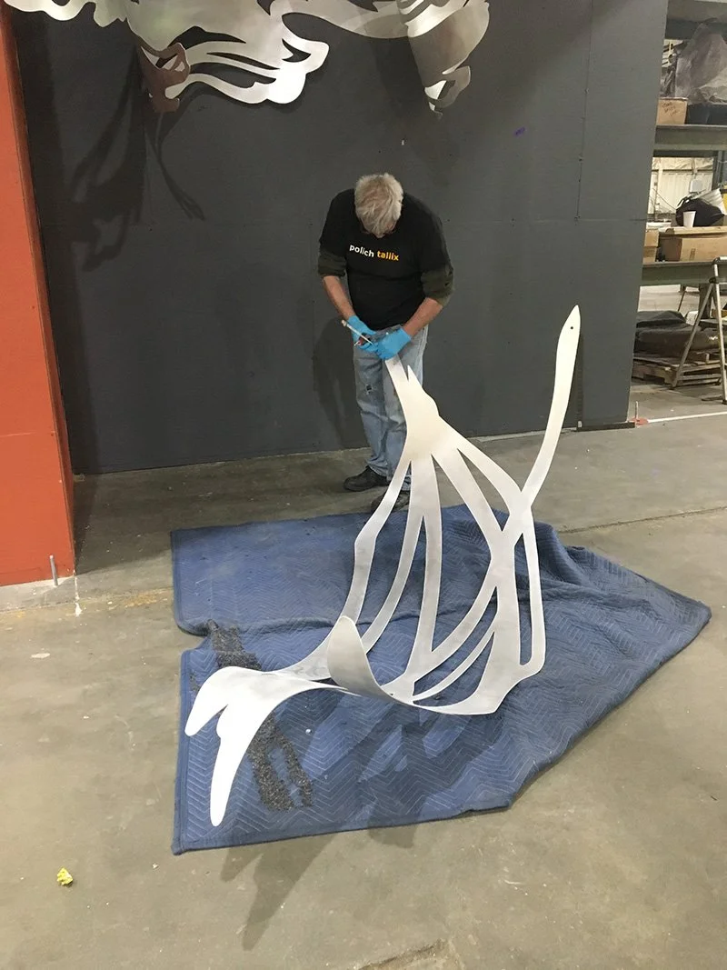 Pieces go up one by one...