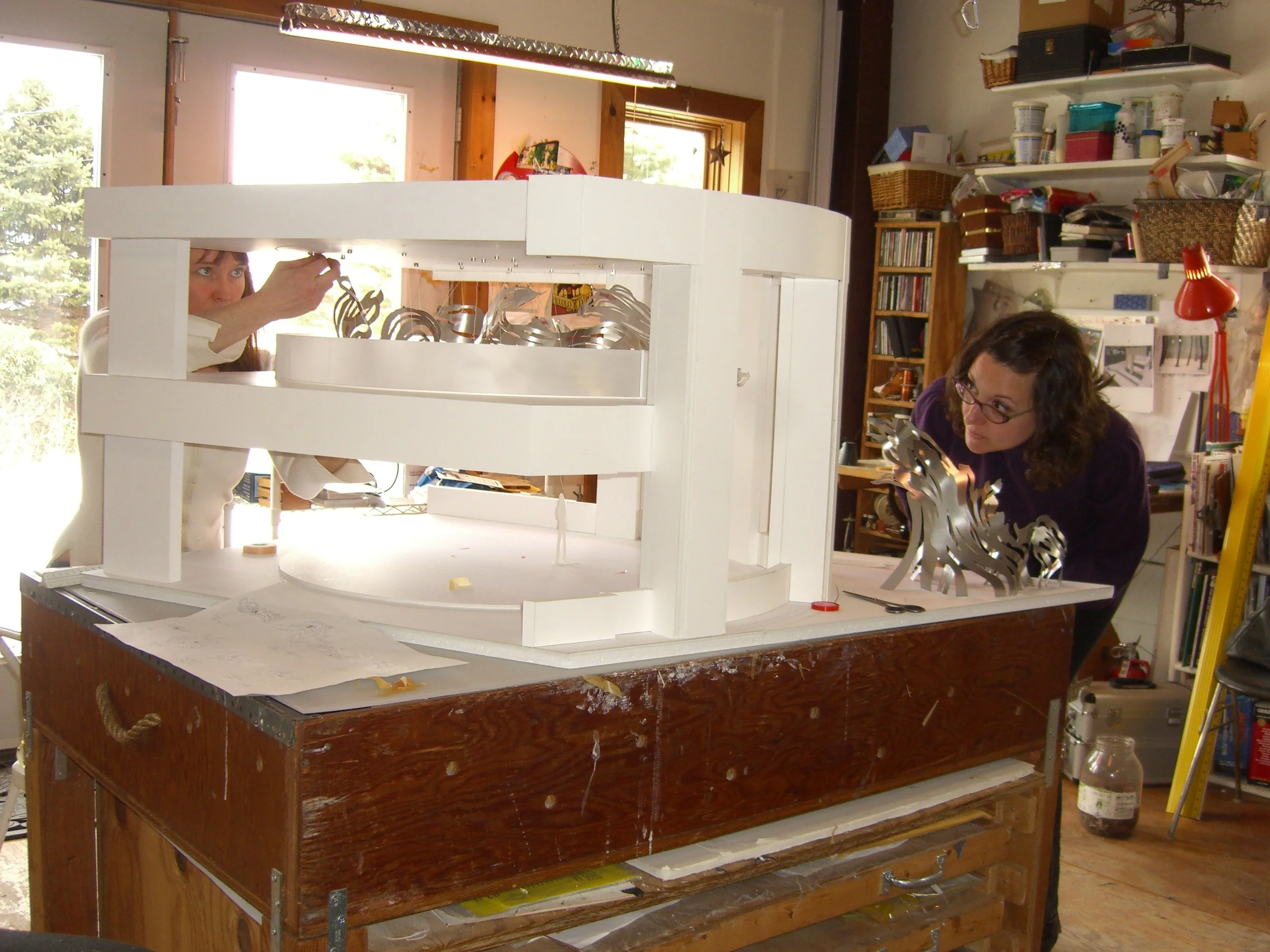 Building the "working model" with Joanie at her studio in upstate NY, February 2012. This scale model was larger and designed so the metal pieces were removable. I had to rearrange quite a few things to conform to safety and code requirements. Then w