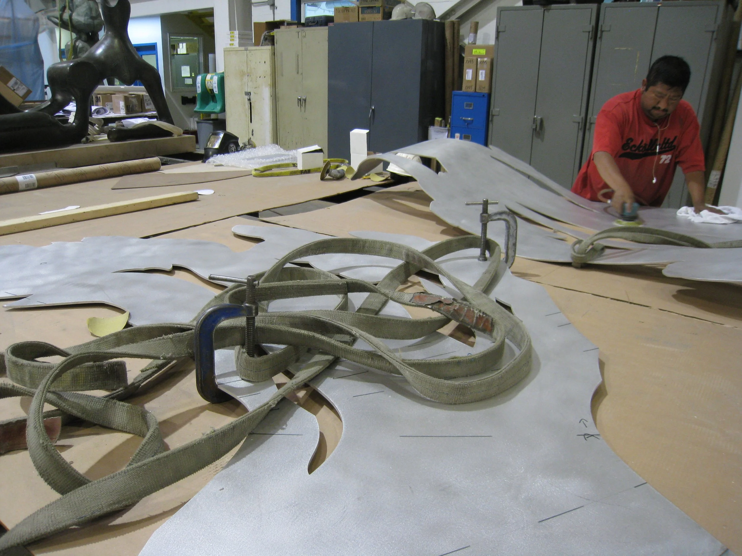 Reynaldo on the orbital sander.