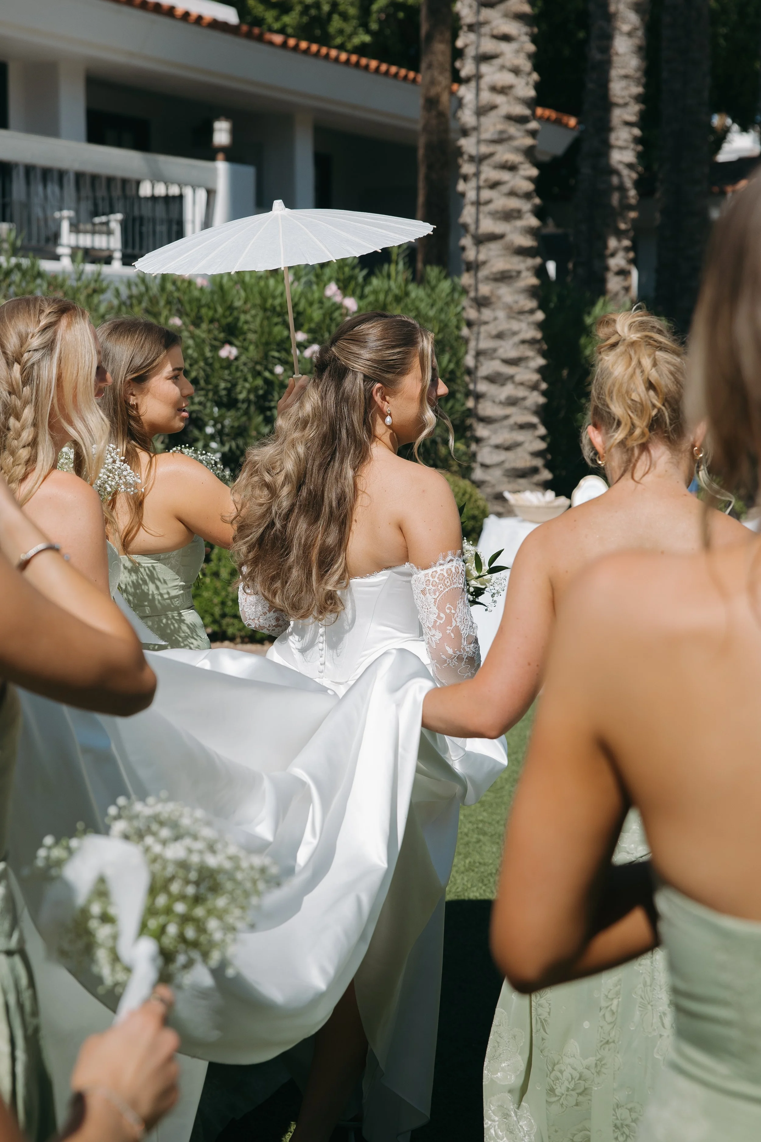 Bridesmaids helping bride prepare for wedding day at The Scott Resort & Spa in Scottsdale