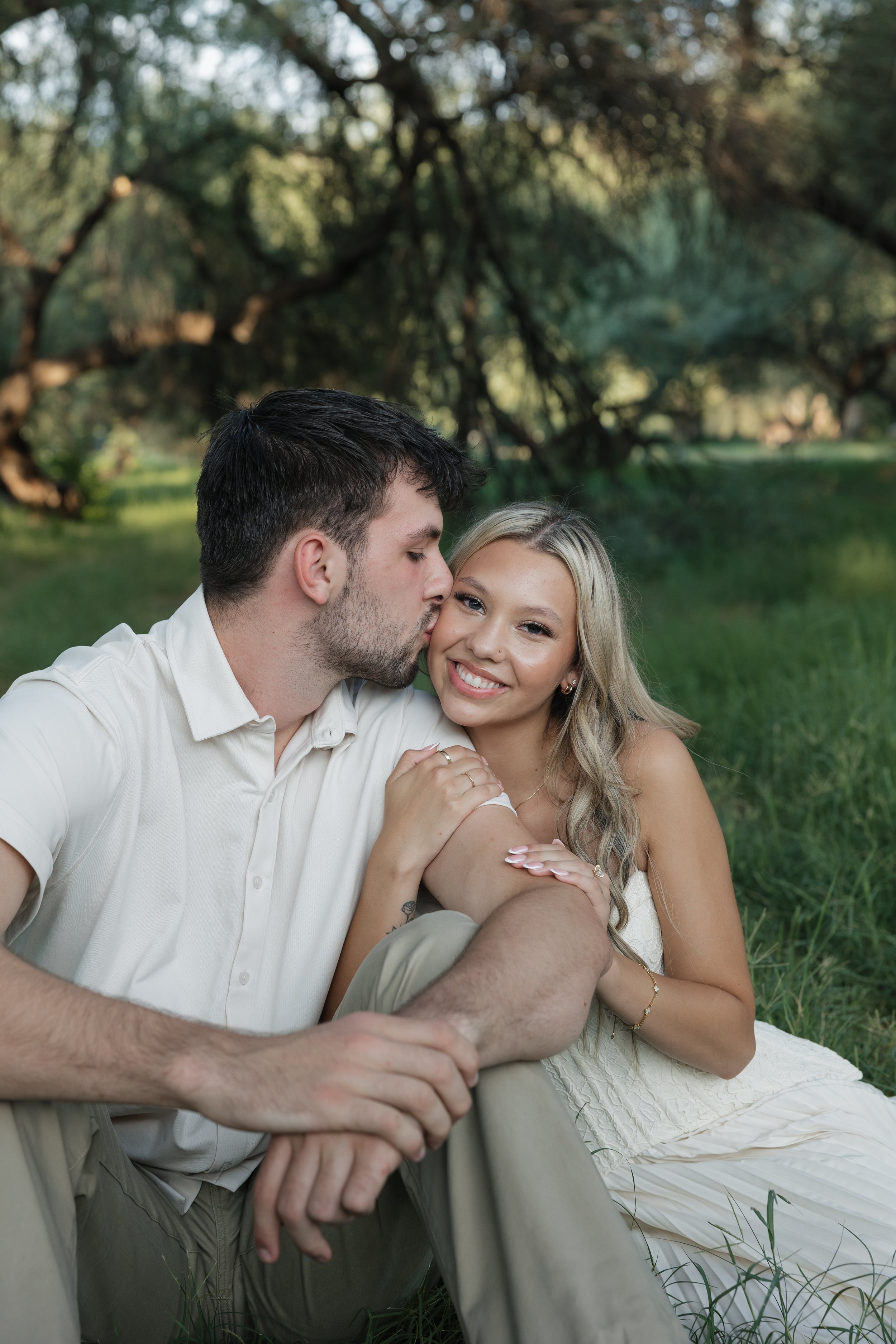 smiling couple at saguaro lake arizona for engagement photos