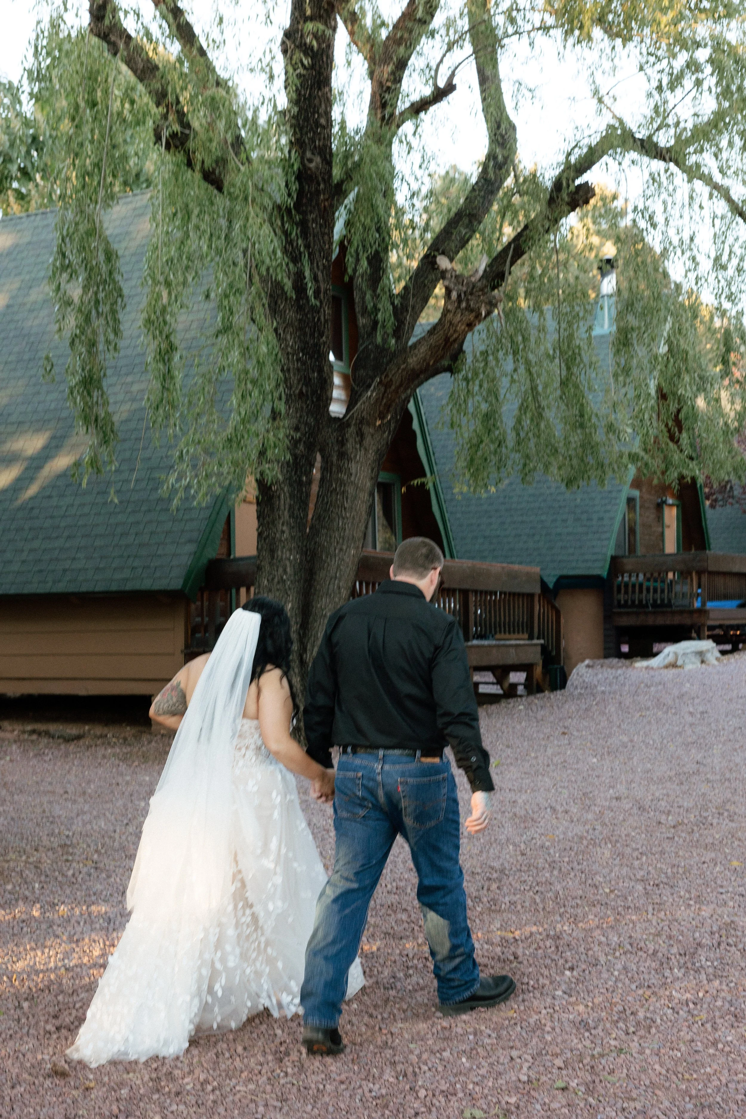 bride and groom walking away from their wedding ceremony as husband and wife with an oregon wedding photographer