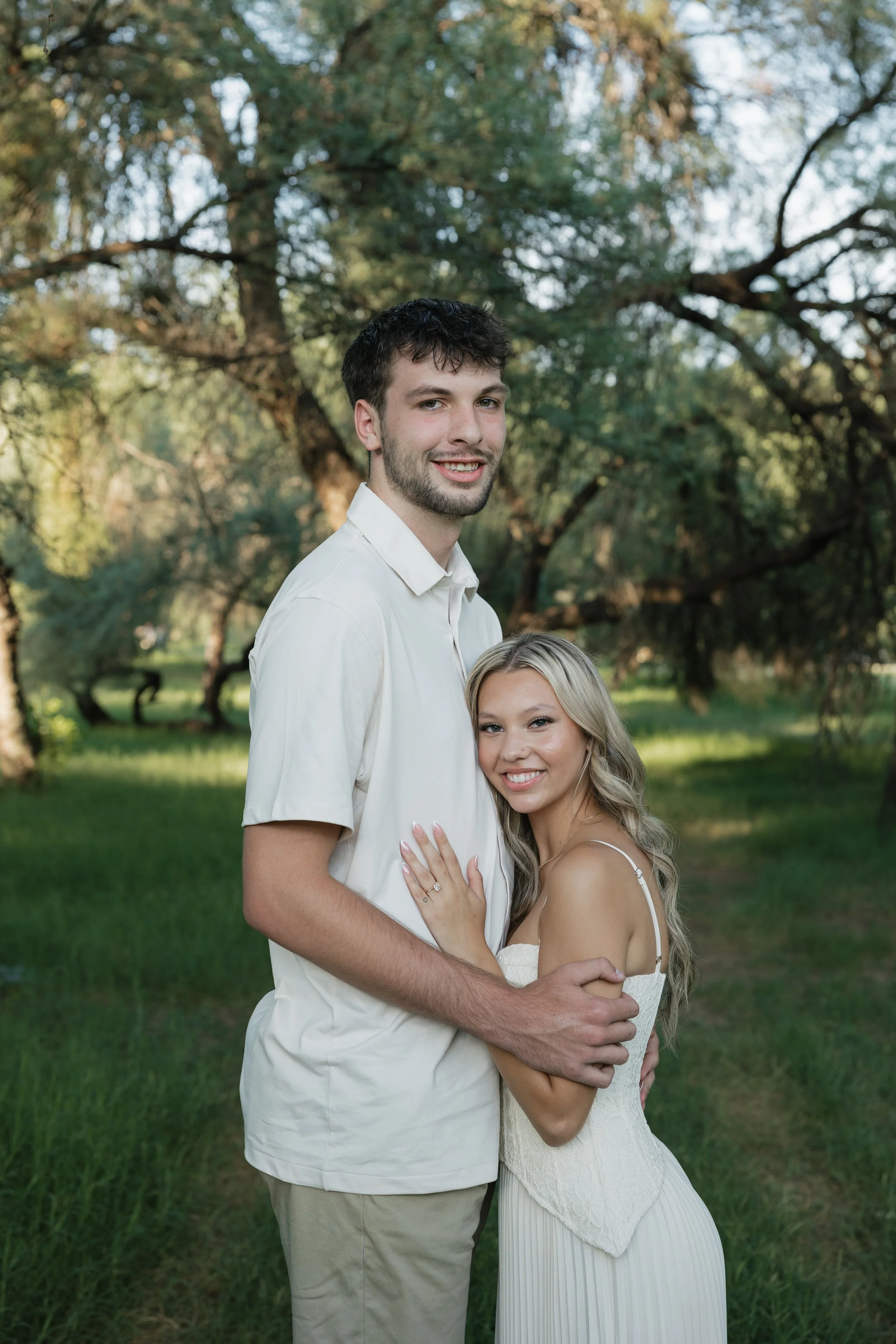 engagement portraits in a green field in arizona