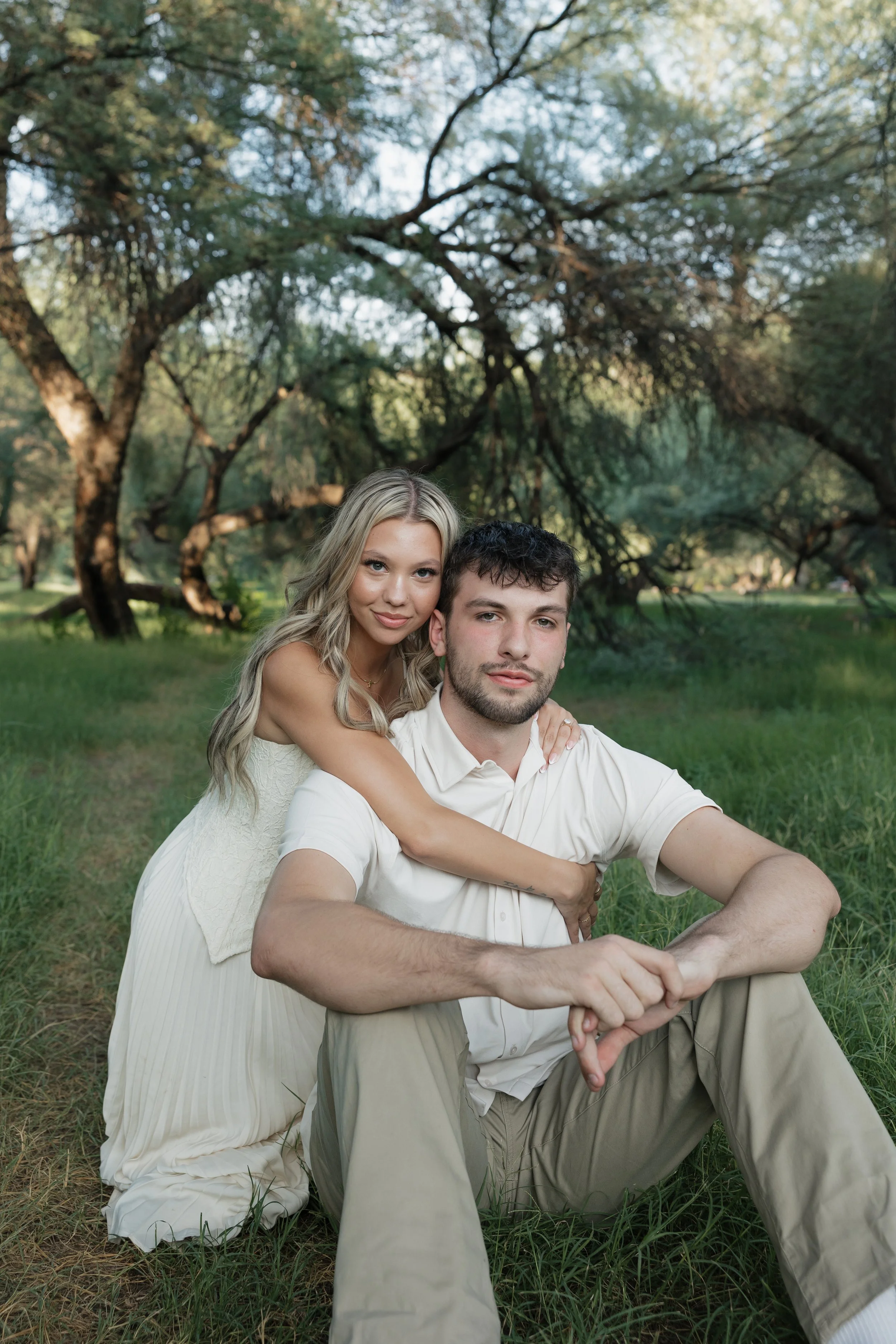 couple posing for engagement photos before their arizona wedding
