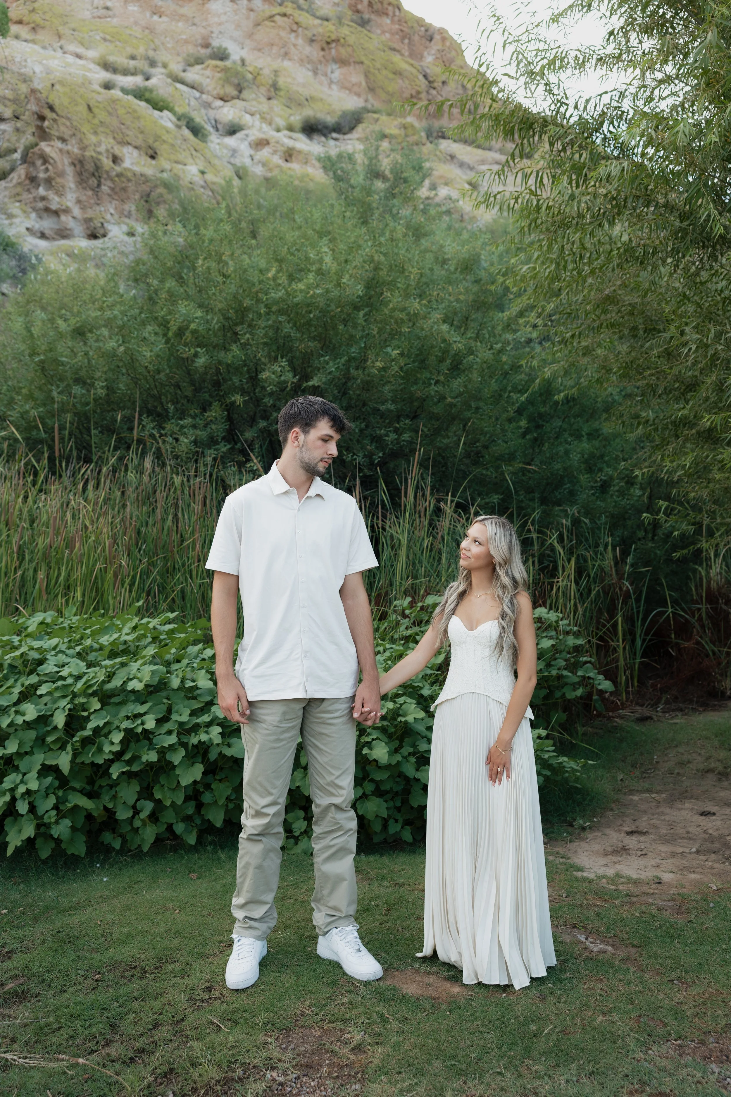 lush green engagement portraits at saguaro lake arizona