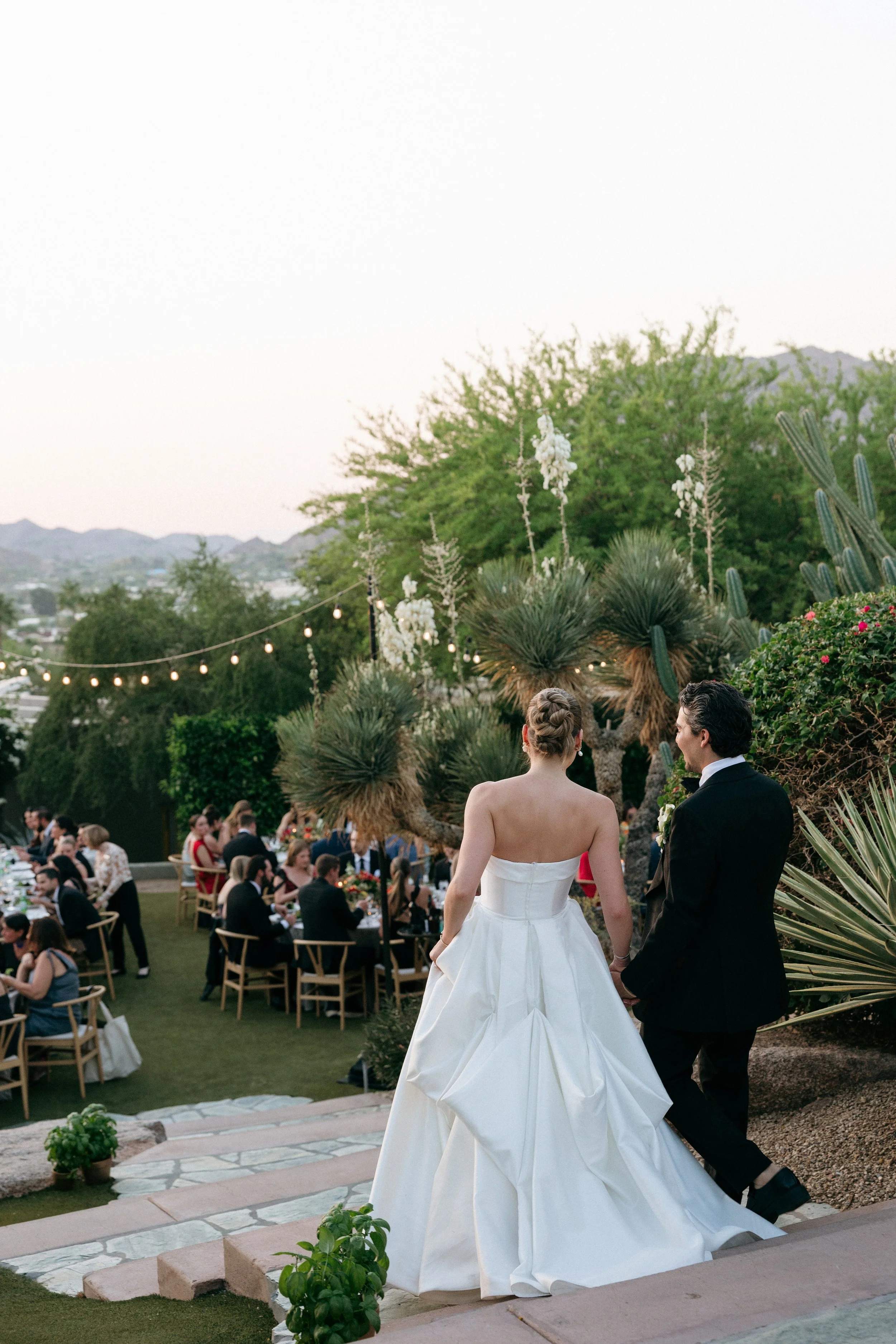 arizona wedding photographer bride and groom entering wedding reception grand entrance the sanctuary camelback wedding