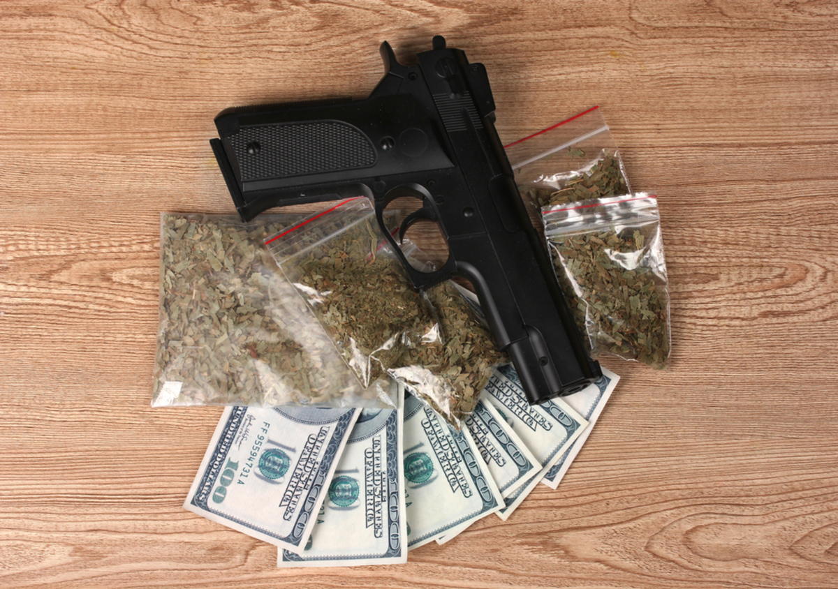 drug trafficking evidence with firearm marijuana and cash related to Utah felony drug defense cases