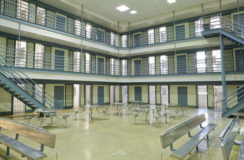 modern jail cell block interior illustrating potential consequences of criminal charges in Utah courts