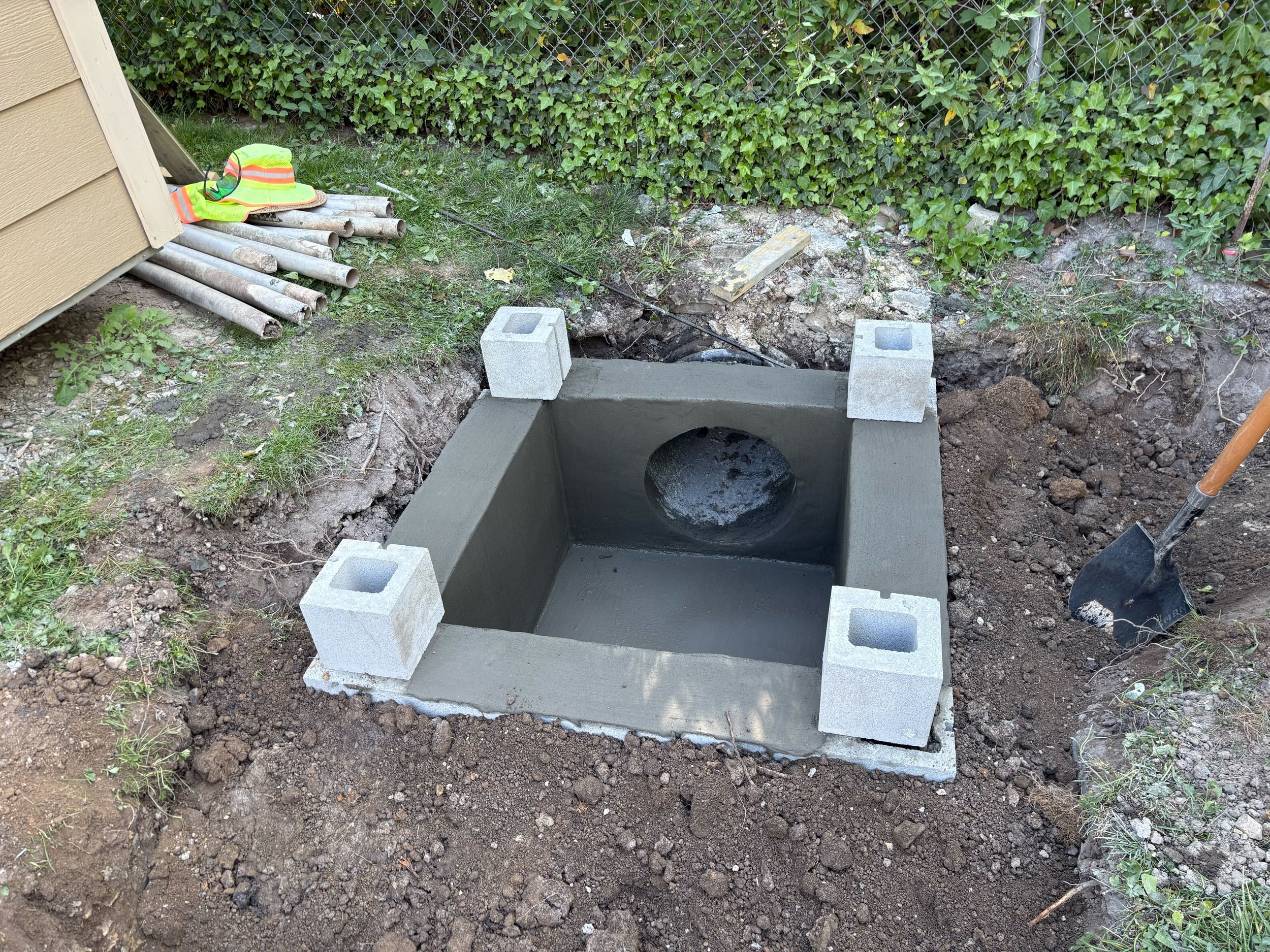 Custom formed and poured concrete catch basin for a public project for the City of Hendersonville 