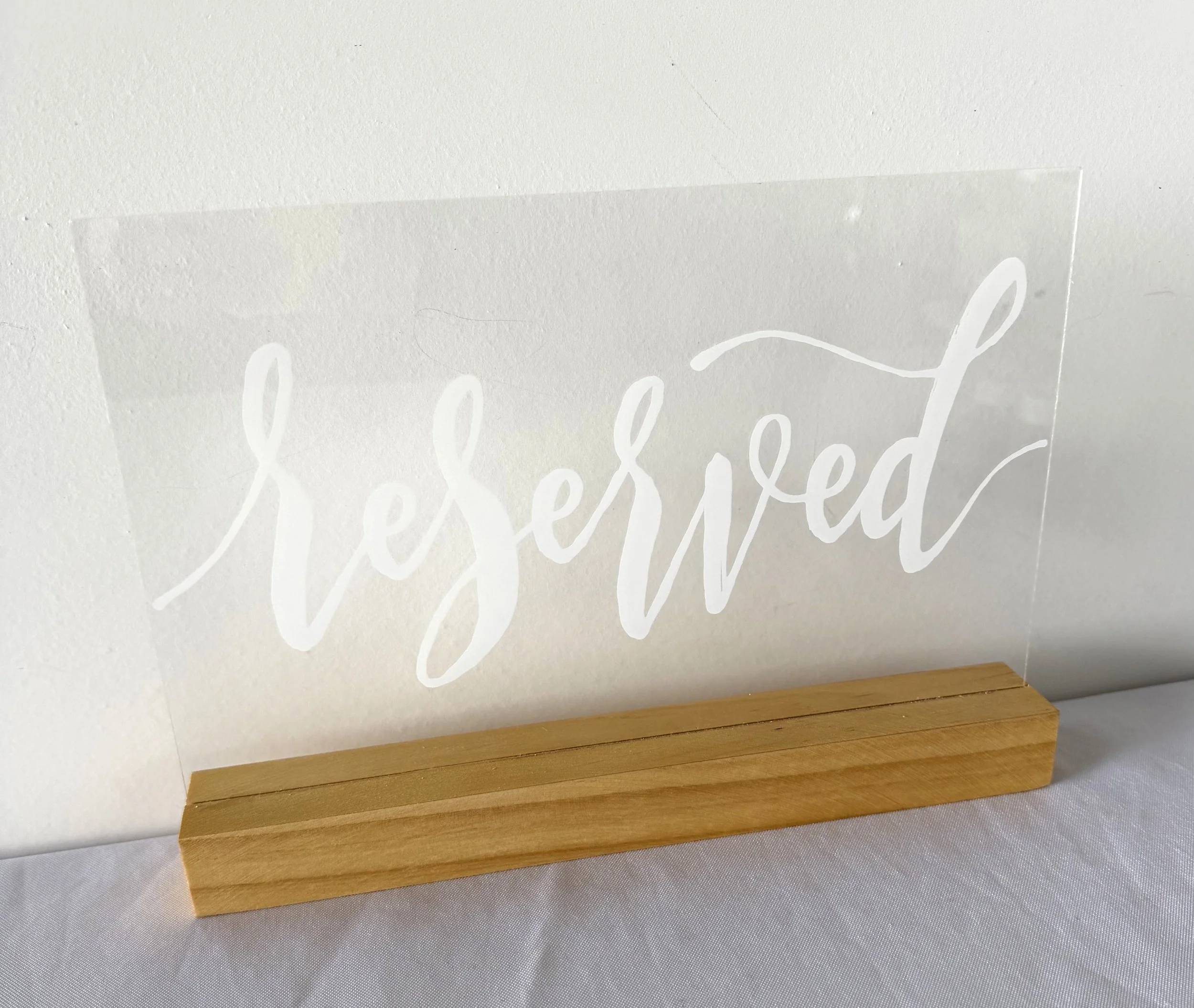 Acrylic Reserved Sign with Wood base and white writing - 4 available