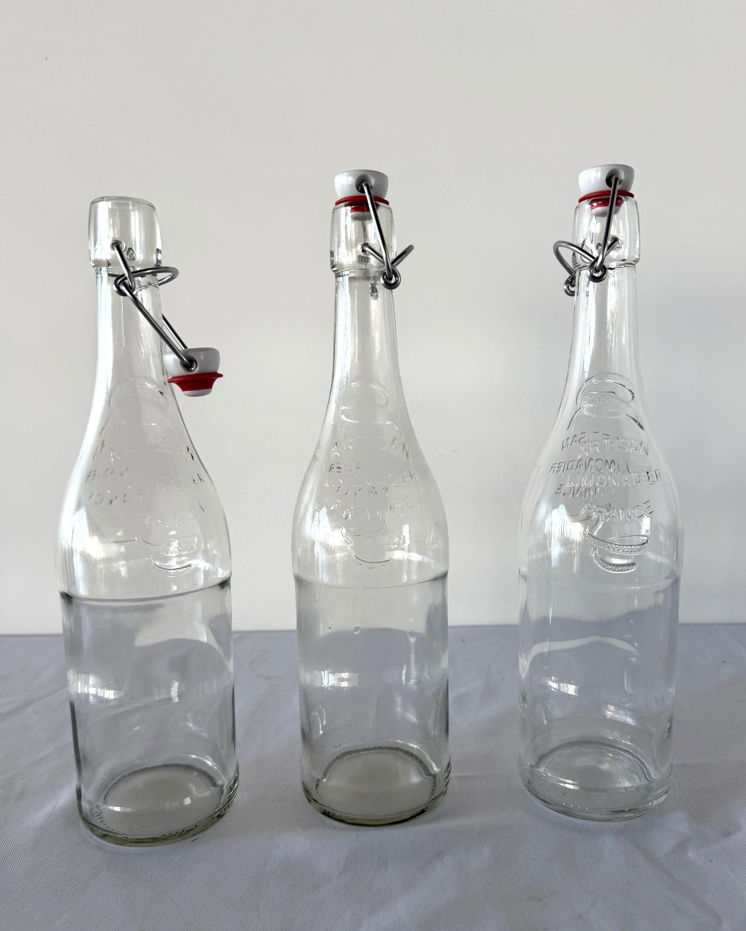 Water Dispensing French Bottles - 30 Available