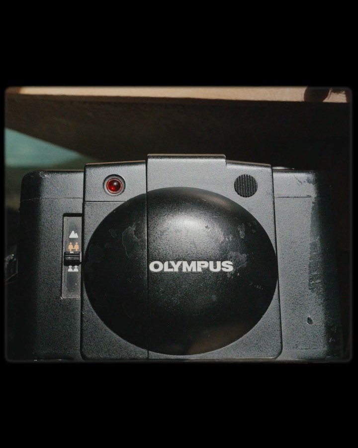 My Favorite Most Hated Camera

This is my Olympus XA2. 
I bought it in Japan, not in the best shape, but still fully working. I fell in love with the compactness and simplicity of this little thing. I can just walk around with it in my pocket. The qu