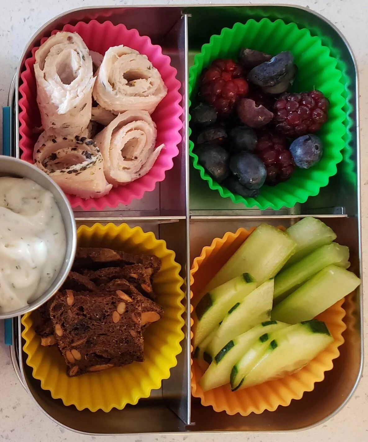 Berries, turkey wraps, crackers, celery, cucumber + ranch