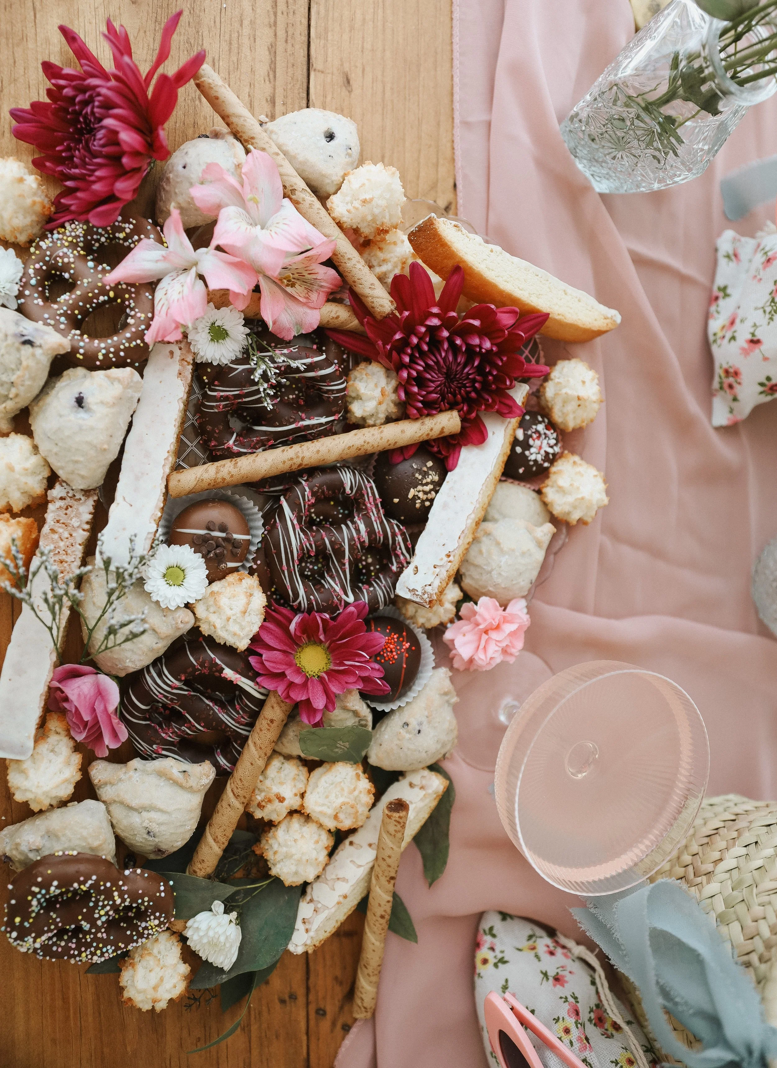 a charcuterie board with sweets on it