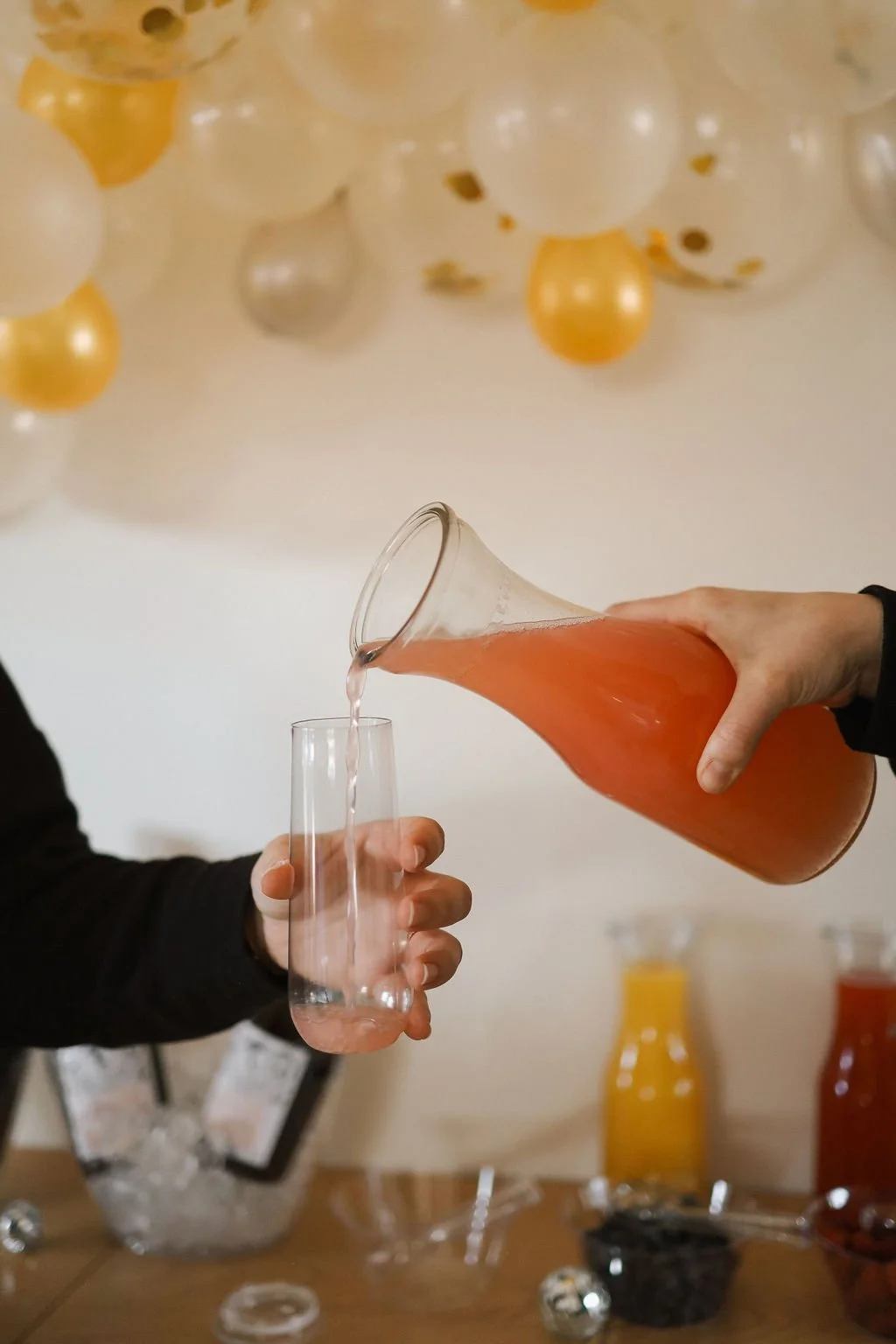 juice being poured into a glass