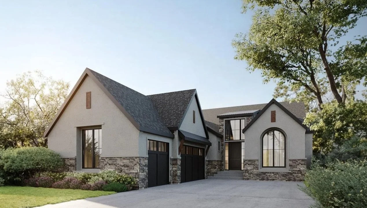 Modern house with stone accents, large windows, and a driveway surrounded by greenery and trees.