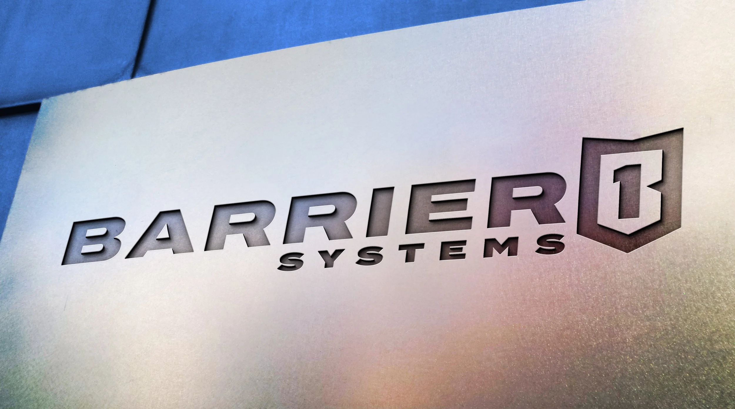 Barrier one logo on metal sign